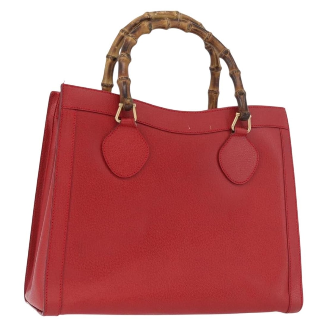 Red Leather Bamboo Handle Handbag by Gucci Model 002 1186 0260: Red Leather Bamboo Handle Handbag by Gucci Model 002 1186 0260 This is a Gucci Bamboo hand bag crafted from red leather with gold-tone accents. The bag features bamboo handles and offers a spacious ma