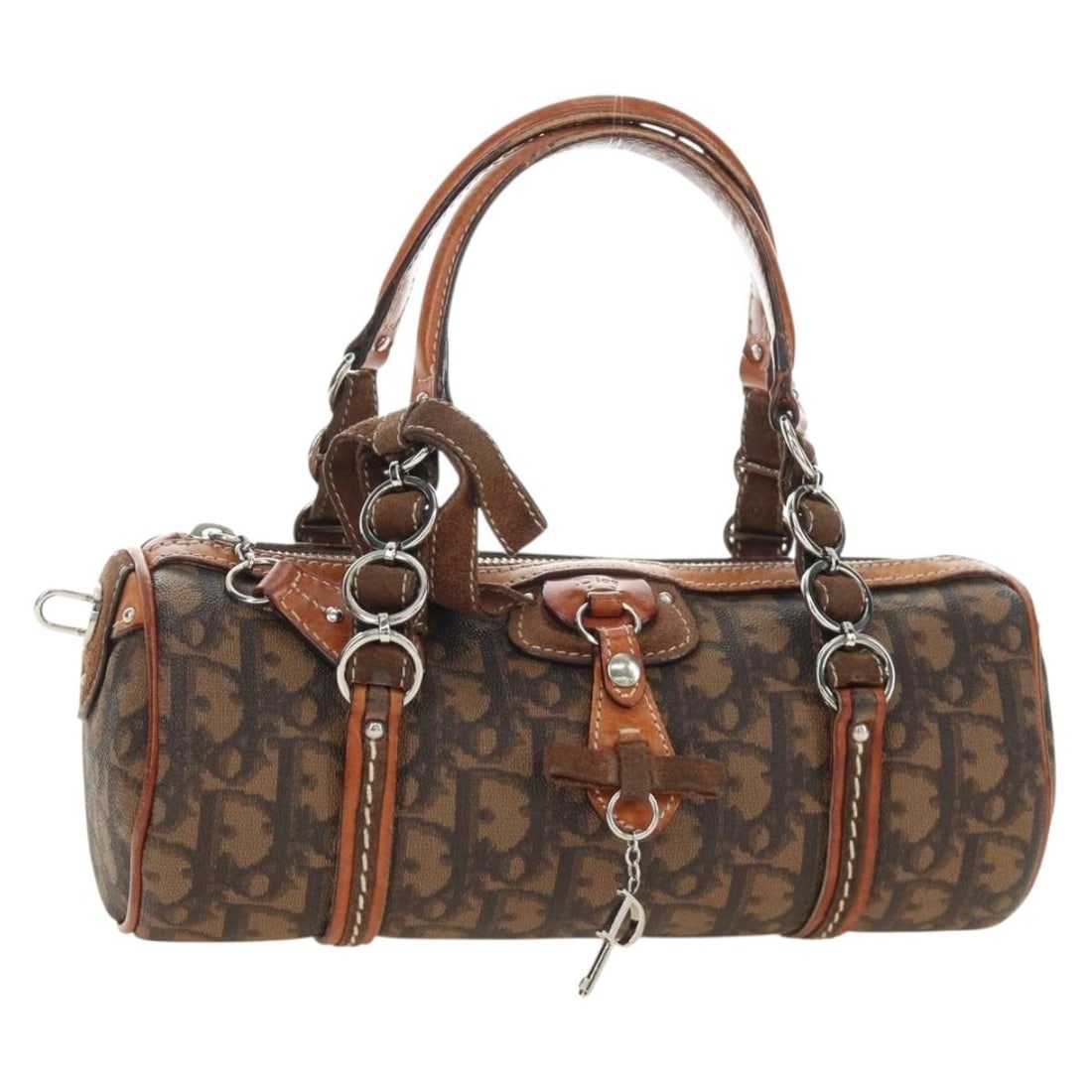 Christian Dior Trotter Brown PVC Leather Hand Bag with Charm: Christian Dior Trotter Brown PVC Leather Hand Bag with Charm Christian Dior Trotter Canvas romantic hand bag in brown and silver, made in Italy. It is crafted from PVC leather and Trotter canvas, and 