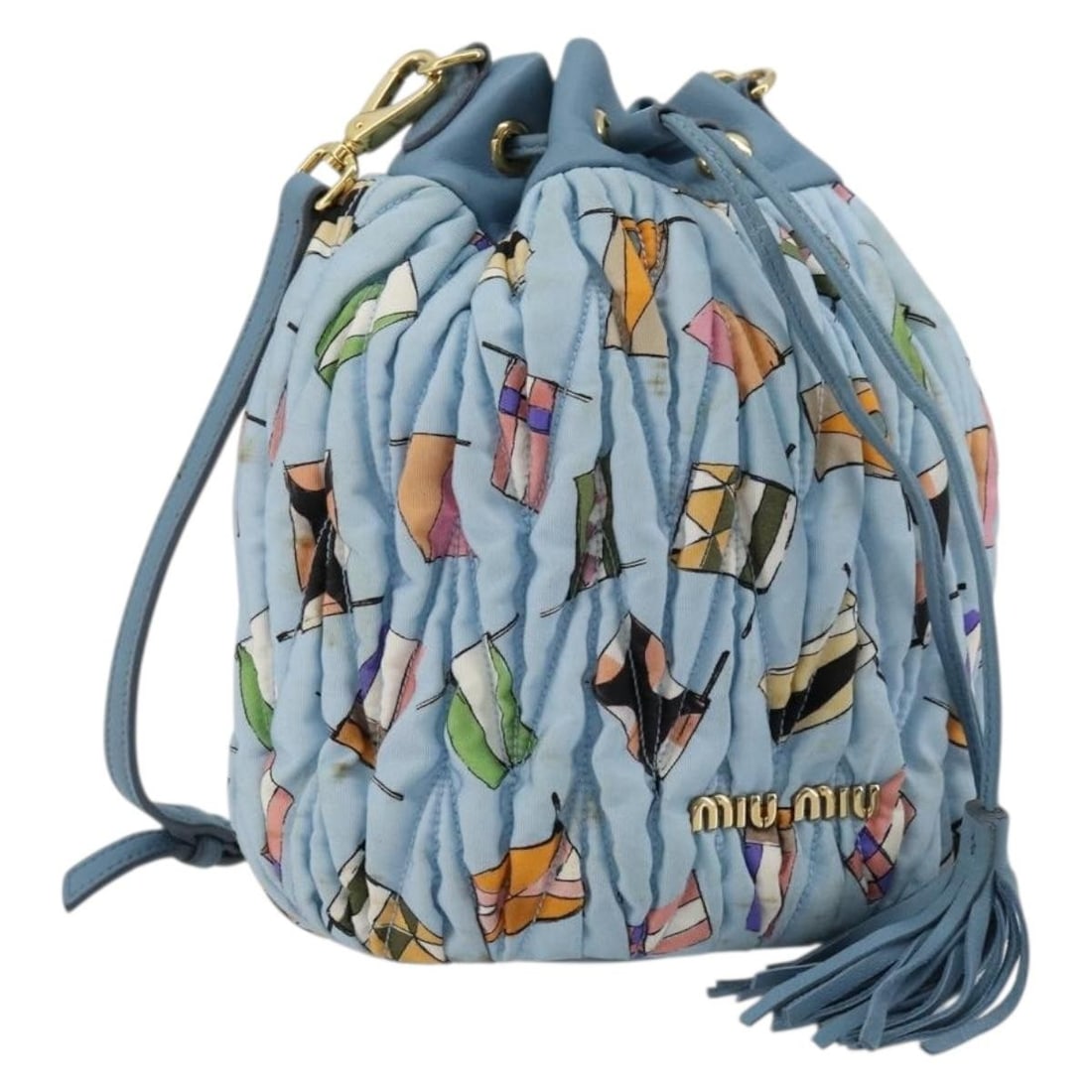 Miu Miu Matelasse Nylon Shoulder Bag Light Blue Gold Tone: Miu Miu Matelasse Nylon Shoulder Bag Light Blue Gold Tone Miu Miu Matelasse shoulder bag in light blue and gold nylon, made in Italy. This women's shoulder bag measures approximately 14 cm W x 23 cm H