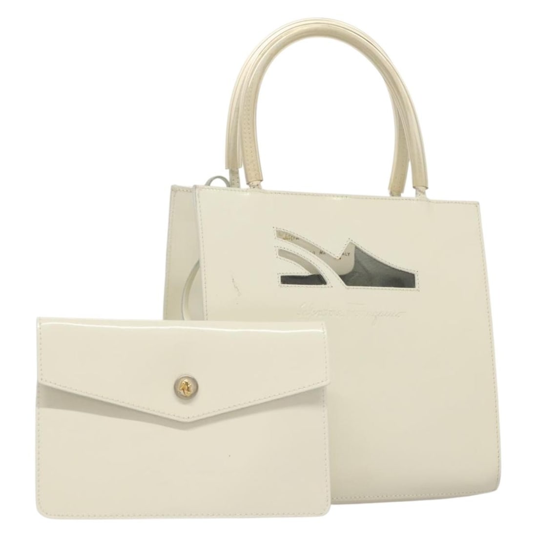 Salvatore Ferragamo White Gold Patent Leather Hand Bag Auth BA4344: Salvatore Ferragamo White Gold Patent Leather Hand Bag Auth BA4344 This elegant Salvatore Ferragamo hand bag is crafted from high-quality patent leather in a stunning white and gold color combination.