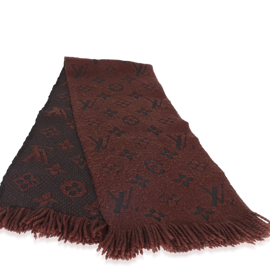 Louis Vuitton Logomania Fringe Wool Scarf Brown 64 in: Louis Vuitton Logomania Fringe Wool Scarf Brown 64 in This Louis Vuitton Logomania Fringe Scarf is crafted from brown monogram fabric and features a classic tie closure. Designed for unisex wear, it o