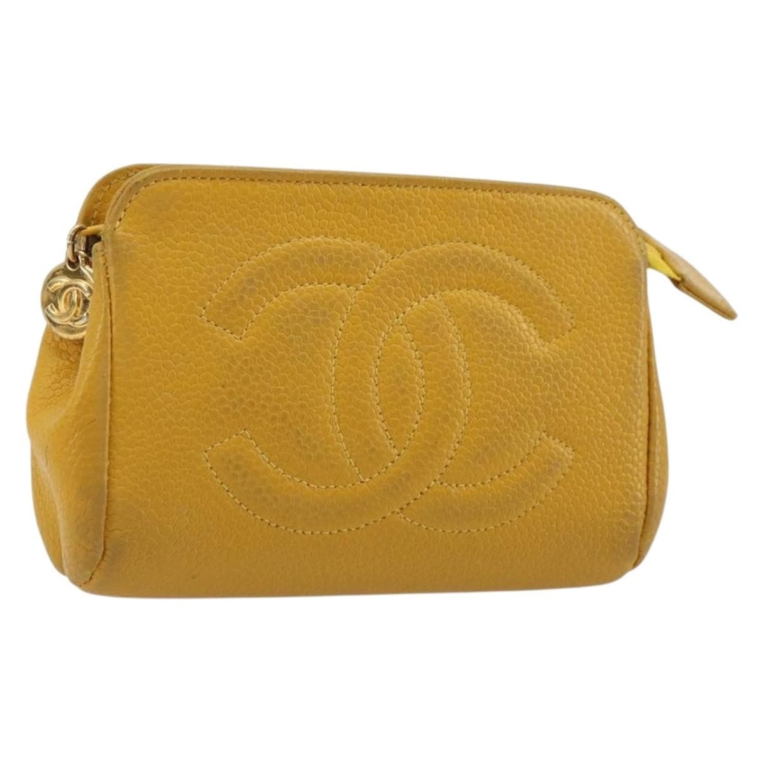 CHANEL Caviar Skin Pouch Yellow Gold CC: CHANEL Caviar Skin Pouch Yellow Gold CC This Chanel pouch is crafted in grained calfskin, also described as caviar skin, in a yellow and gold colorway. A heavily used piece, it shows noticeable wear t