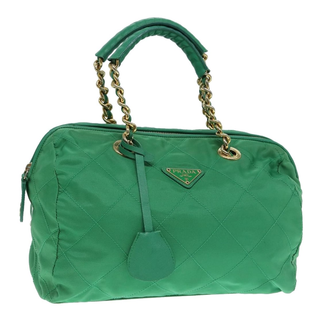 PRADA Nylon Hand Bag Green with Dust Bag Key and Clochette: PRADA Nylon Hand Bag Green with Dust Bag Key and Clochette PRADA hand bag in green and gold nylon, made in Italy. It comes with a dust bag, two keys, and a clochette. The bag is described as heavily u