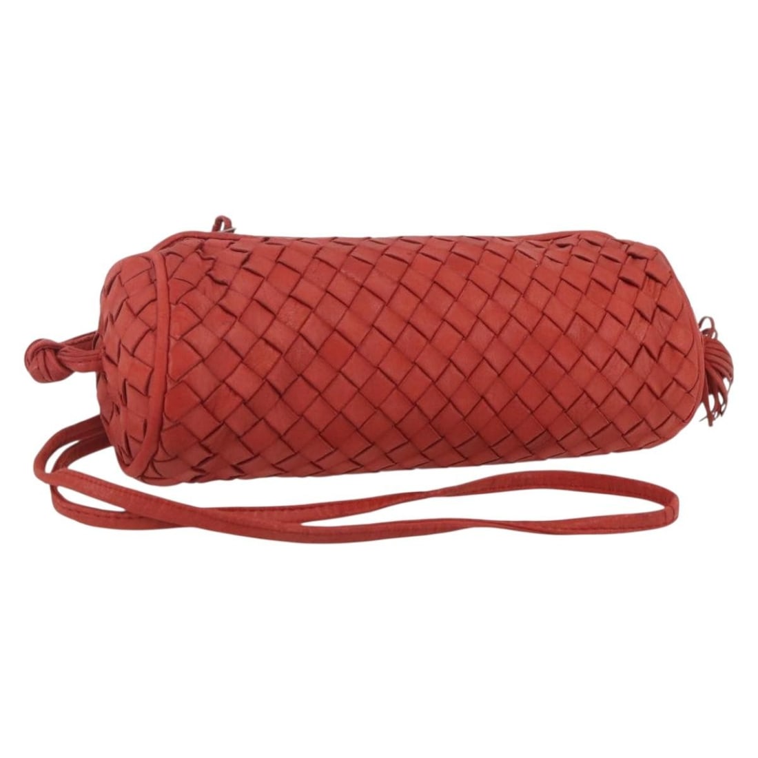 Red Intrecciato Leather Pouch by Bottega Veneta Italy: Red Intrecciato Leather Pouch by Bottega Veneta Italy This Bottega Veneta Intrecciato pouch is crafted from red leather and features the brand's signature woven design. The pouch is made in Italy and 
