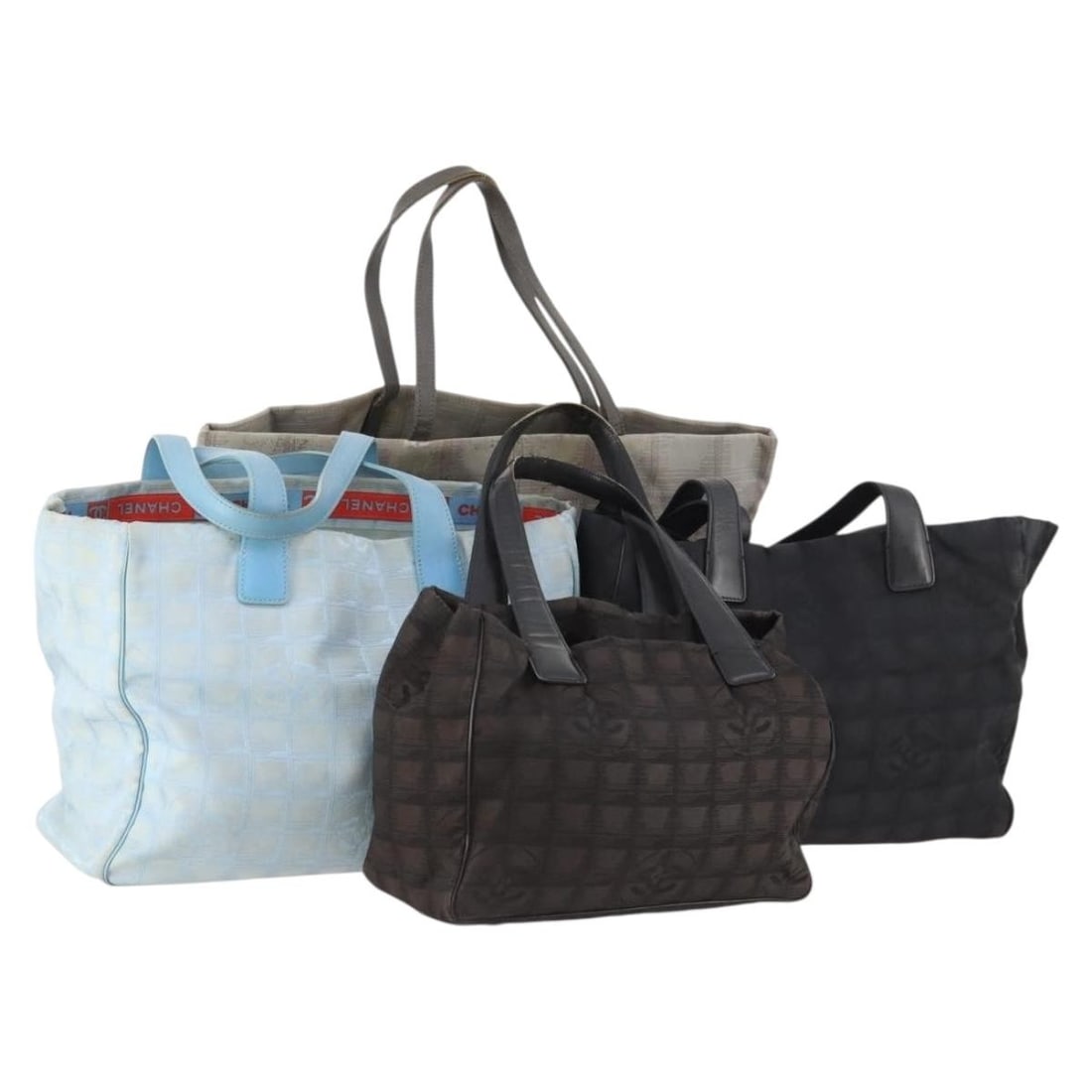 Set of 4 Chanel New Travel Line Nylon Tote Bags CC Black Gray Light Blue: Set of 4 Chanel New Travel Line Nylon Tote Bags CC Black Gray Light Blue CHANEL New Travel Line tote bag 4-piece set in nylon with a black, gray, and light blue color combination. This women's tote ba