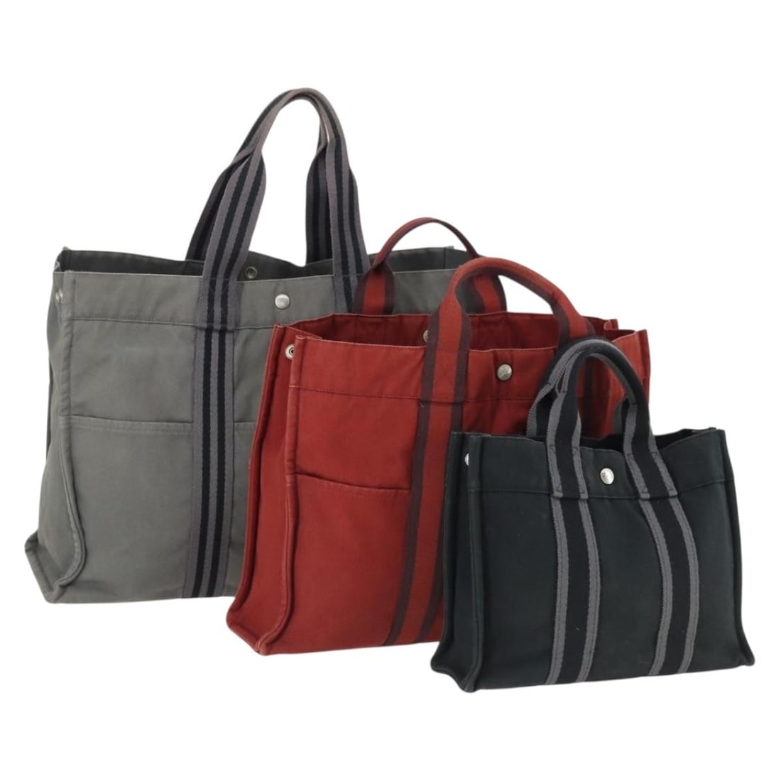 3 Hermes Fourre Tout cotton handbags gray black red: 3 Hermes Fourre Tout cotton handbags gray black red Hermes Fourre Tout hand bag set in gray, black, and red, made in France with cotton exterior material. This special set sale is offered as-is and in