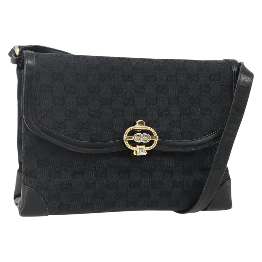 Gucci Black Gold GG Canvas Shoulder Handbag Italy: Gucci Black Gold GG Canvas Shoulder Handbag Italy This is a Gucci GG Canvas shoulder bag in black and gold, made in Italy. It features GG canvas construction with a shoulder bag style and comes with o