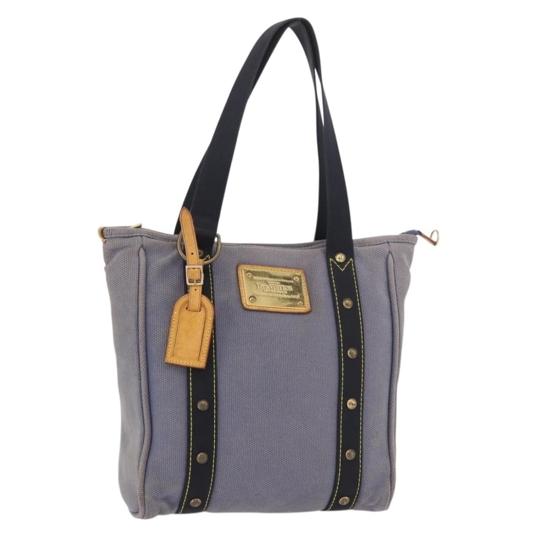 Louis Vuitton Antigua Cabas MM blue canvas tote M40087: Louis Vuitton Antigua Cabas MM blue canvas tote M40087 This LOUIS VUITTON Antigua Cabas MM Tote Bag in blue is crafted from canvas and features a spacious interior. The bag includes a name tag accesso