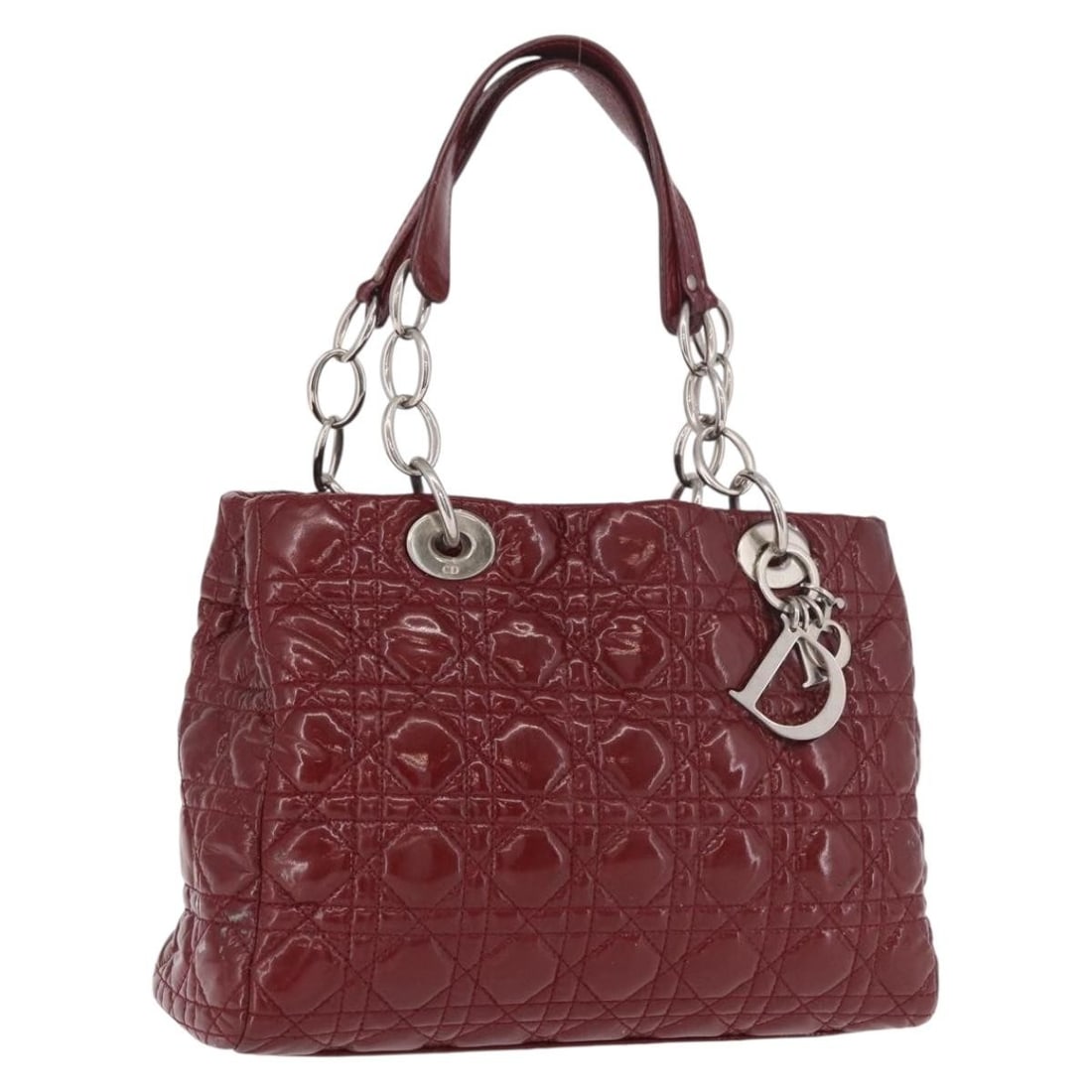 Christian Dior Lady Dior red patent leather handbag with charm: Christian Dior Lady Dior red patent leather handbag with charm Christian Dior Lady Dior Canage hand bag in red and silver patent leather, made in Italy. It includes a charm accessory and has a structu
