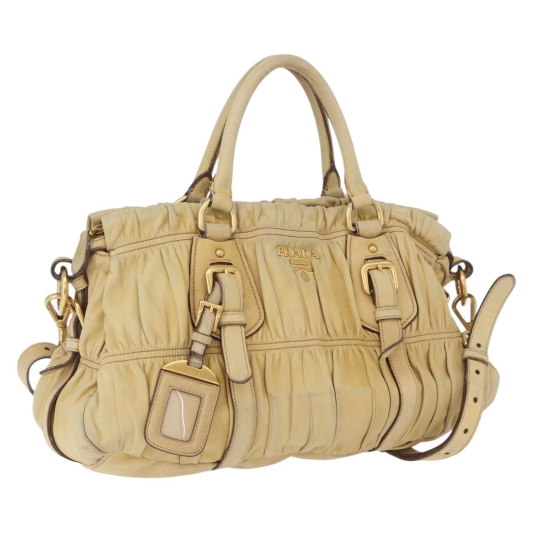 PRADA Ivory Leather 2way Handbag with Shoulder Strap: PRADA Ivory Leather 2way Handbag with Shoulder Strap Prada hand bag in leather with an ivory and gold exterior. It features a 2-way design and comes with a shoulder strap and name tag. Made in Italy, 