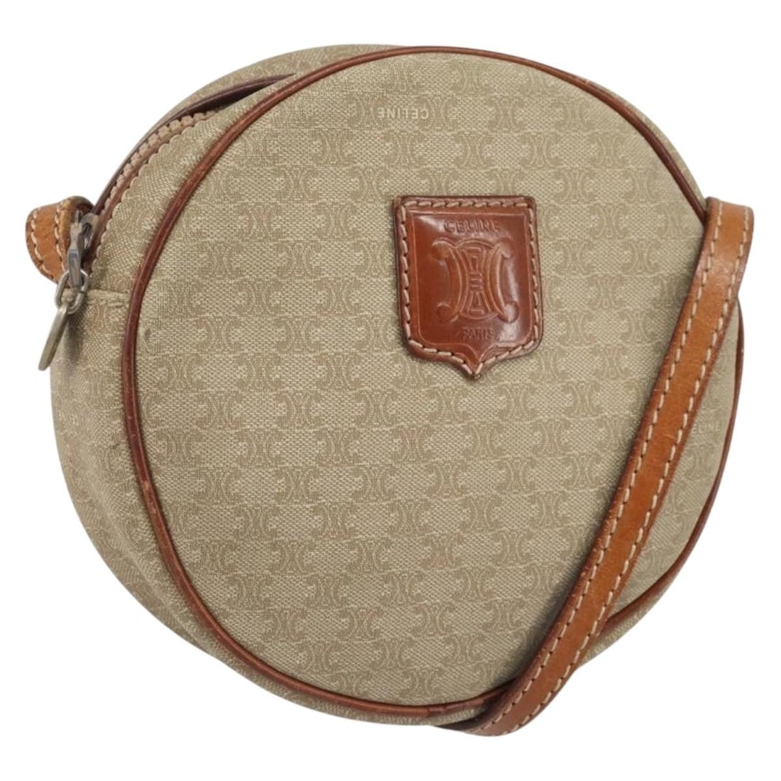 Celine Beige Macadam PVC Canvas Shoulder Bag for Women: Celine Beige Macadam PVC Canvas Shoulder Bag for Women This is a Celine Macadam Canvas shoulder bag crafted from beige PVC leather, designed for women. The bag features a compact, square silhouette wi