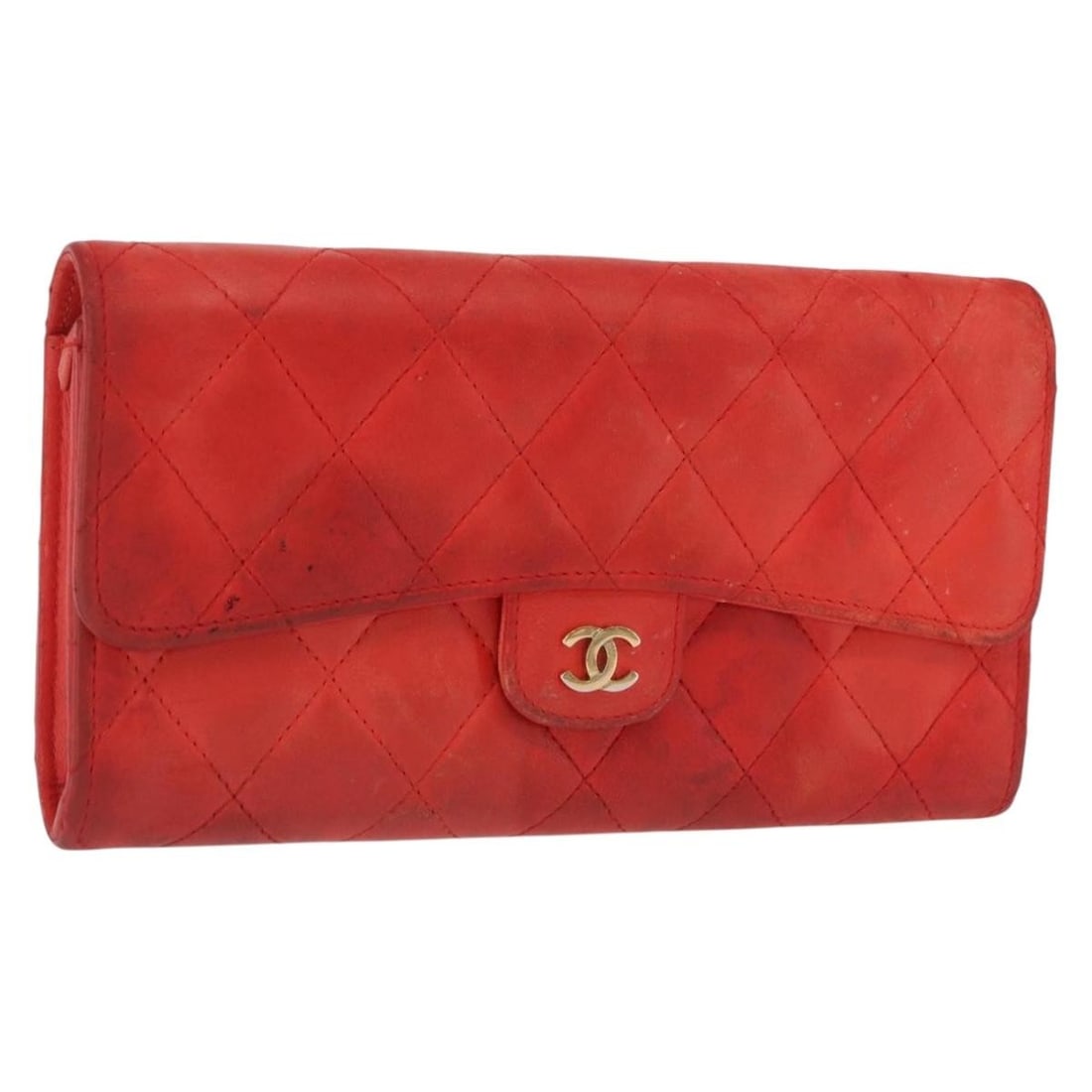 Red Lambskin Matelasse Long Wallet by CHANEL with CC Logo: Red Lambskin Matelasse Long Wallet by CHANEL with CC Logo This CHANEL Matelasse long wallet is crafted from red lambskin leather and features the classic CC logo. Made in Spain, it is designed in a lo