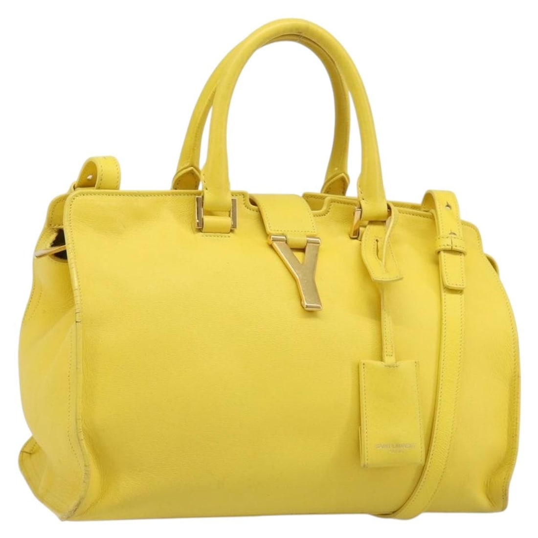 Saint Laurent Baby Cabas Leather 2way Handbag Yellow Gold: Saint Laurent Baby Cabas Leather 2way Handbag Yellow Gold This Saint Laurent Baby Cabas handbag is crafted from leather in yellow/gold and features a 2-way design. It comes with a dust bag, clochette,