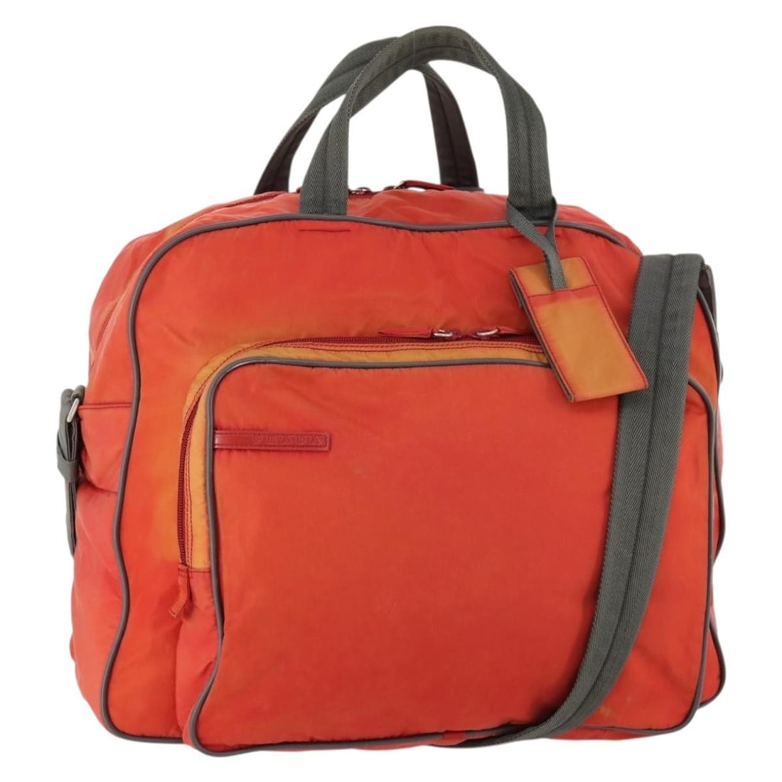 Prada Nylon Orange Silver Boston Bag 2way with Strap and Padlock: Prada Nylon Orange Silver Boston Bag 2way with Strap and Padlock This PRADA Sports Boston Bag is crafted from durable nylon in a striking orange and silver color combination. Designed for versatility,