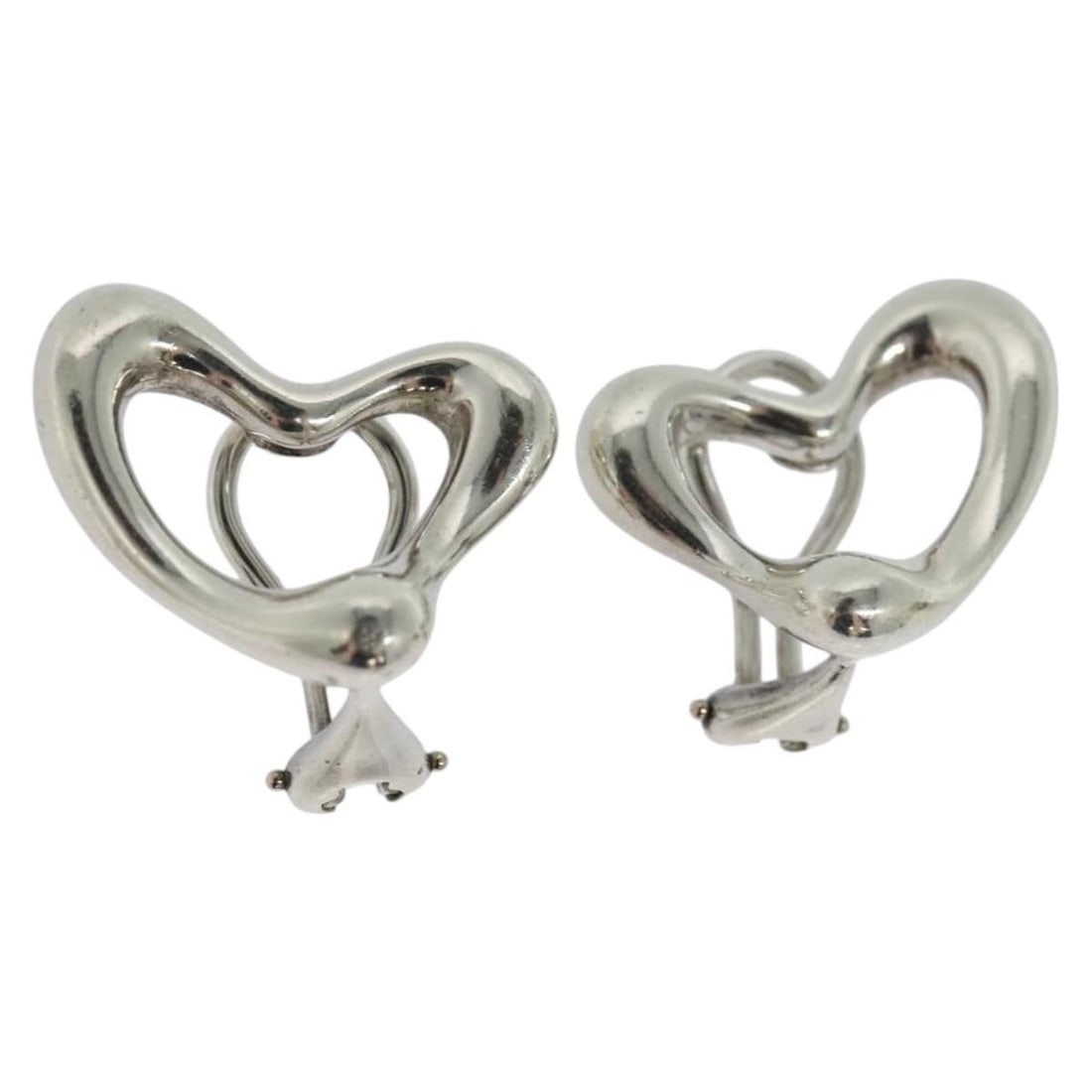 Tiffany & Co Open Heart Silver Earring for Women Italy: Tiffany & Co Open Heart Silver Earring for Women Italy These Tiffany & Co. Open Heart earrings are crafted from Ag925 silver and feature a classic open heart design. Made in Italy, these earrings are 