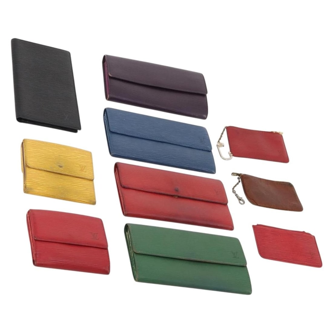 10 Louis Vuitton Epi Leather Wallets Black Red Blue LV: 10 Louis Vuitton Epi Leather Wallets Black Red Blue LV Louis Vuitton Epi leather wallet in black, red, and blue. This wallet is offered as a special set and is in heavily used condition with visible w