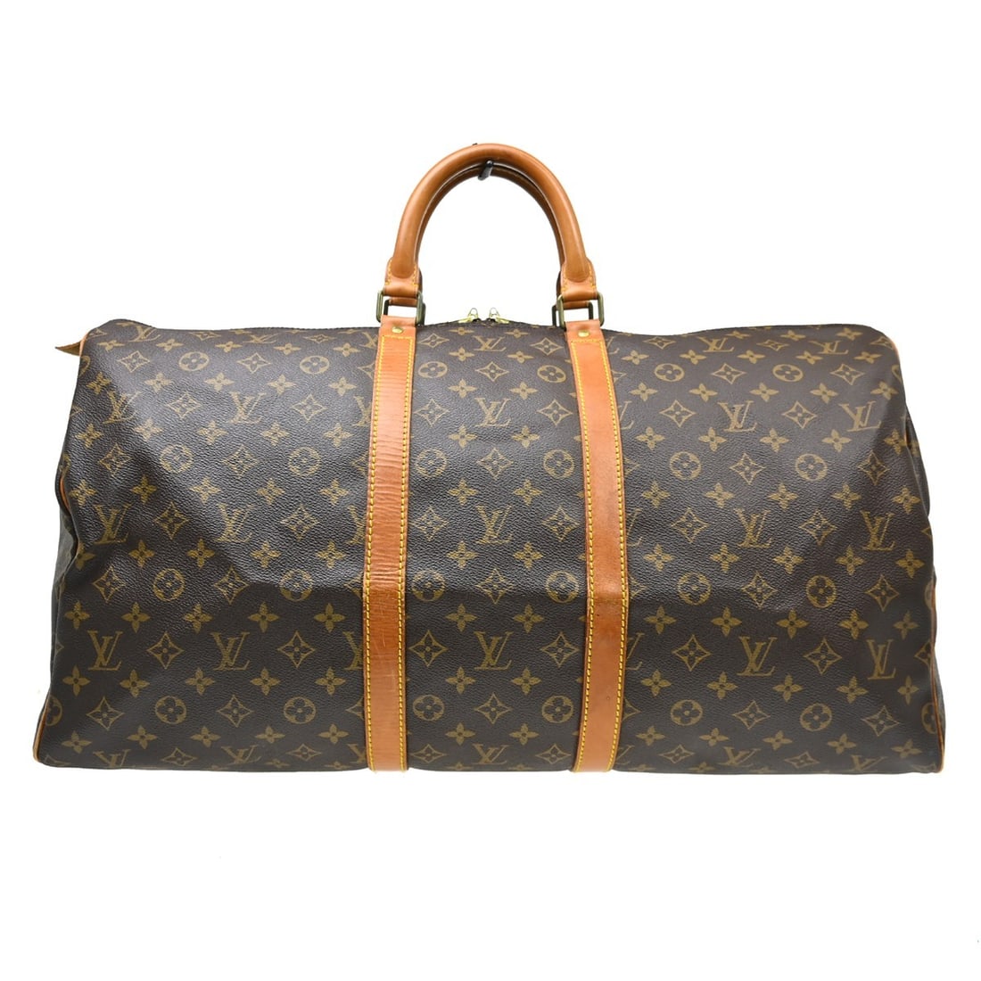 Louis Vuitton Keepall 55 Monogram Canvas Duffle Bag M41424: Louis Vuitton Keepall 55 Monogram Canvas Duffle Bag M41424 Vintage Louis Vuitton Keepall 55 travel handbag in brown Monogram canvas with leather trim and double handles. This unisex duffle-style bag f