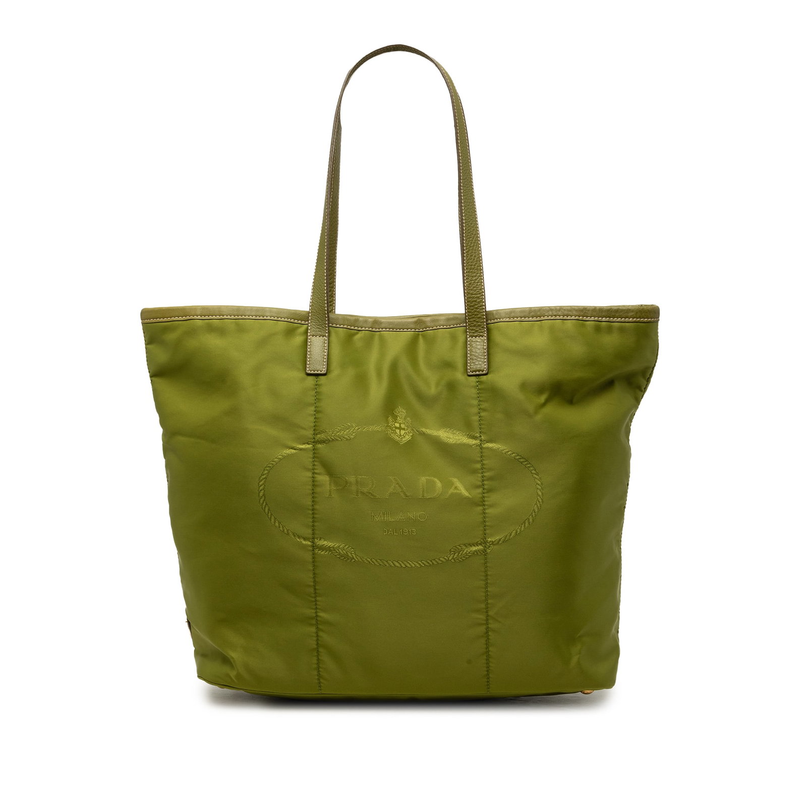 Prada Tessuto Canapa Tote Bag Green Nylon Leather Handles: Prada Tessuto Canapa Tote Bag Green Nylon Leather Handles Prada Tessuto Canapa Logo Tote in green, made in Italy, with a nylon body and flat leather handles. It has an open top with magnetic snap clos