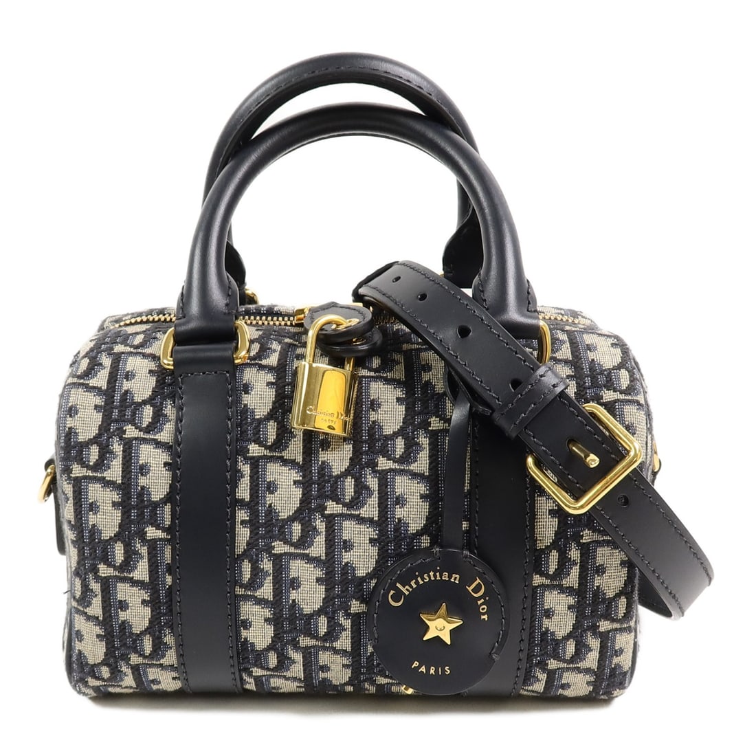 Dior Groove 20 Canvas 2 Way Shoulder Bag Blue White GHW: Dior Groove 20 Canvas 2 Way Shoulder Bag Blue White GHW A Christian Dior Groove 20 2-way shoulder bag in blue and white canvas. It features a fastener closure, one open interior pocket, one interior z