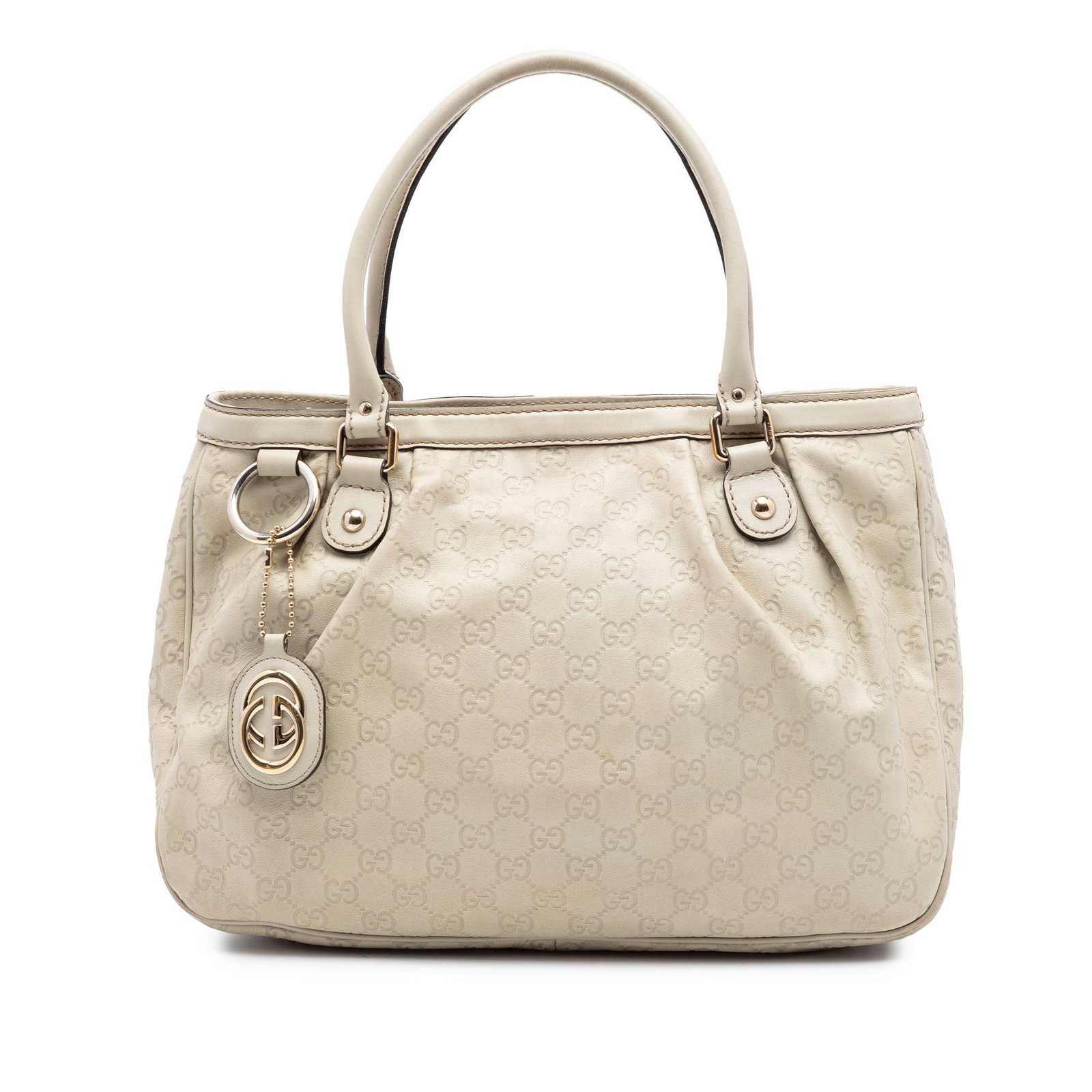 Gucci Guccissima Sukey Brown Leather Tote Bag: Gucci Guccissima Sukey Brown Leather Tote Bag Guccissima Sukey tote in brown embossed leather with rolled leather handles and an open top with magnetic snap closure. The interior includes zip and slip