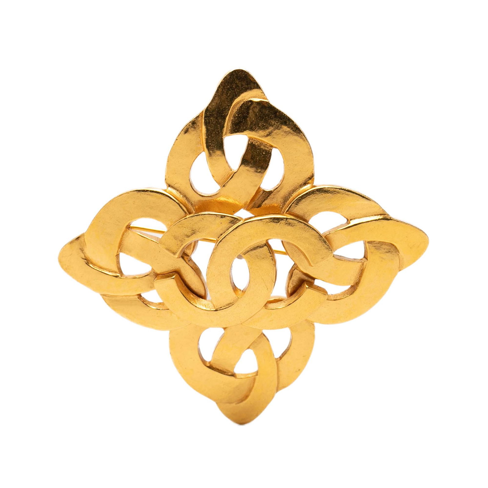 Chanel Twisted CC Gold Plated Metal Brooch: Chanel Twisted CC Gold Plated Metal Brooch Chanel CC twisted brooch in gold-plated metal with a back pin closure. This costume jewelry piece is made in France and shows scratches to the front, back, a