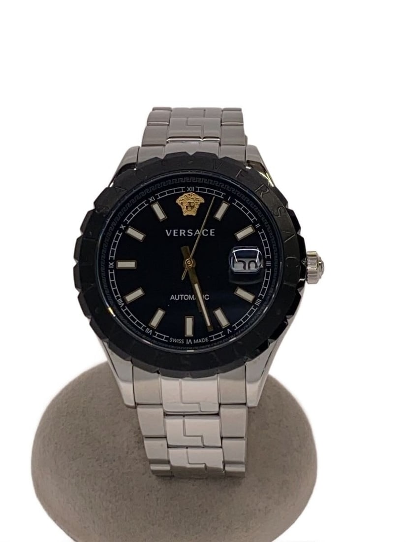 Mens stainless steel wristwatch VERSACE VEZI black dial automatic date: Mens stainless steel wristwatch VERSACE VEZI black dial automatic date Versace VEZI automatic date men's wristwatch with a black dial and stainless steel construction. This pre-owned Swiss-made watch 