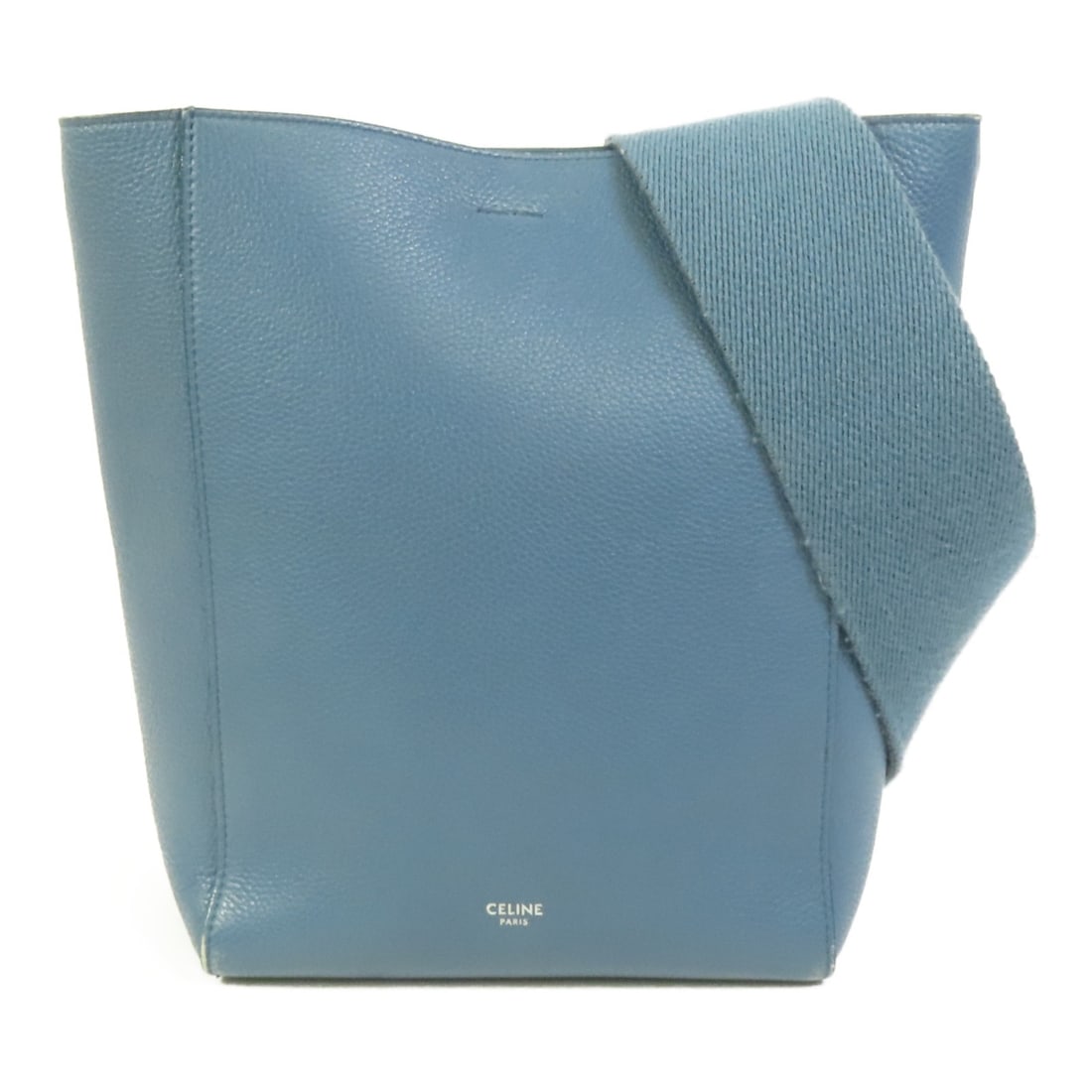 CELINE Sangle Blue Calfskin Bucket Shoulder Bag SHW: CELINE Sangle Blue Calfskin Bucket Shoulder Bag SHW CELINE Sangle Bucket Shoulder Bag in blue calfskin leather. This women's regular-size bag is made in France, with country of origin listed as Italy.