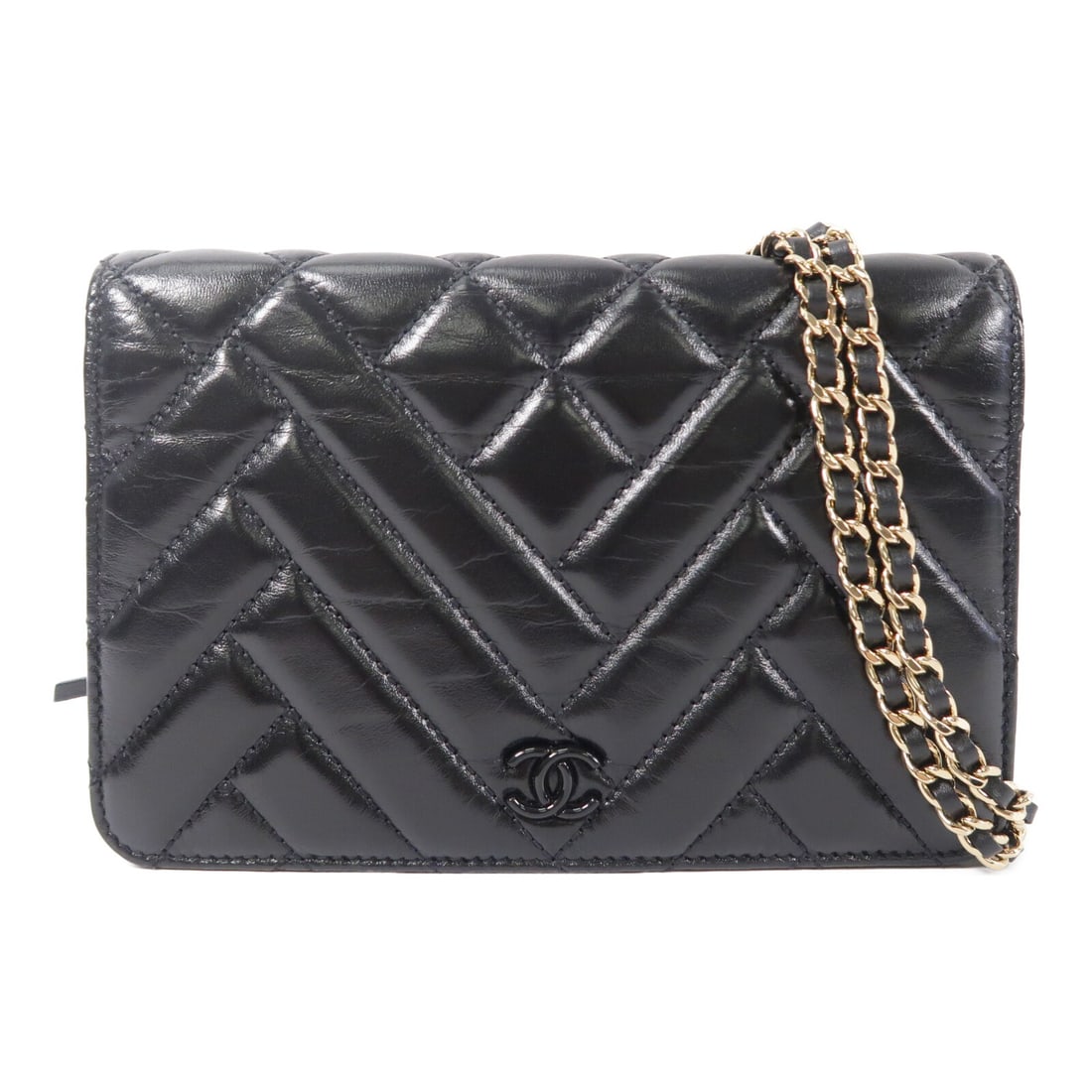 CHANEL WOC shoulder bag in black calfskin with CC and GHW: CHANEL WOC shoulder bag in black calfskin with CC and GHW A CHANEL Wallet On Chain shoulder bag in black calfskin (cowhide) with CC gold-tone hardware. It features a magnetic pocket, an exterior open 