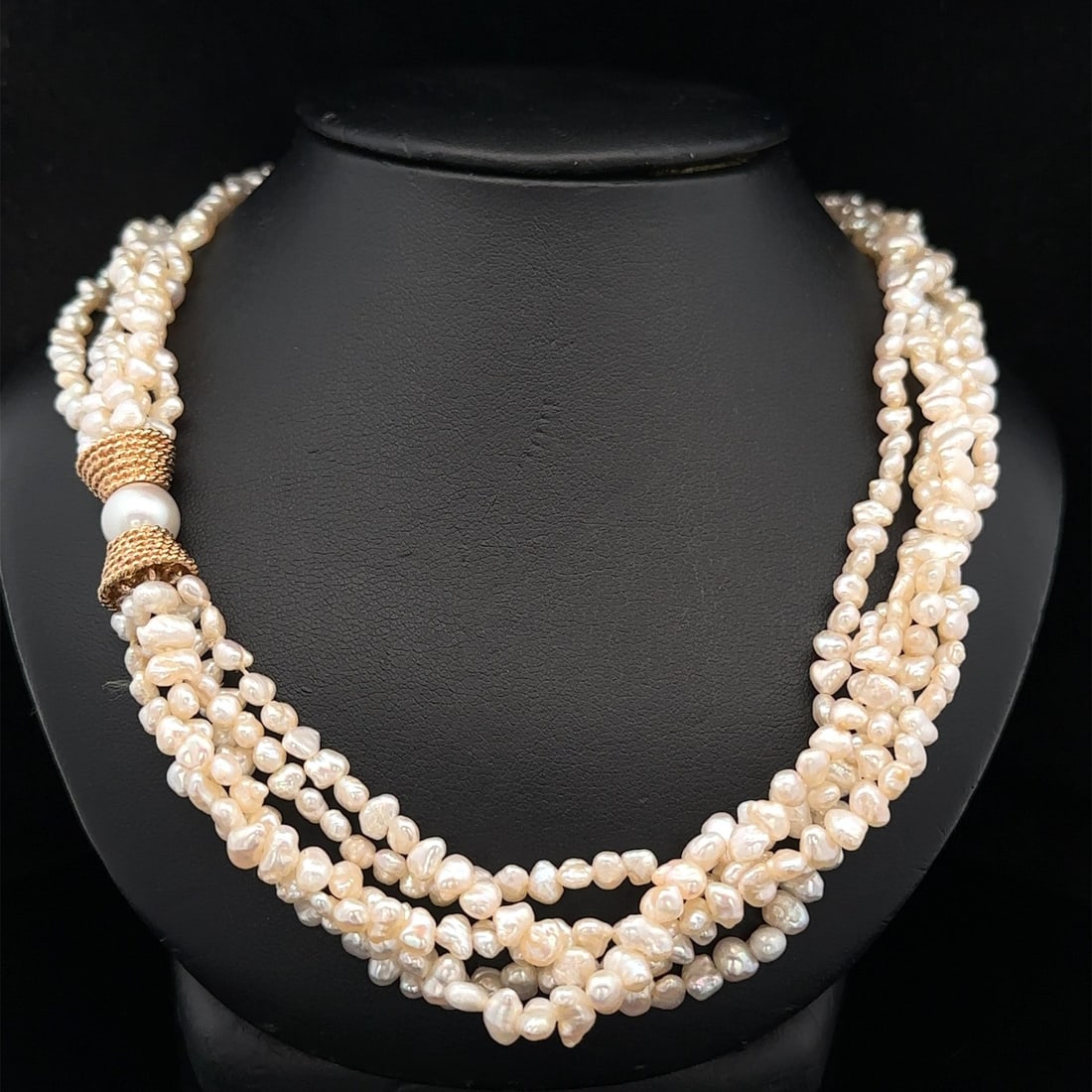 Multi Strand Natural Freshwater Pearl Necklace with 14k Yellow Gold Clasp: Multi Strand Natural Freshwater Pearl Necklace with 14k Yellow Gold Clasp This vintage multi-strand necklace features numerous natural freshwater baroque pearls ranging from approximately 4.2mm to 5.3