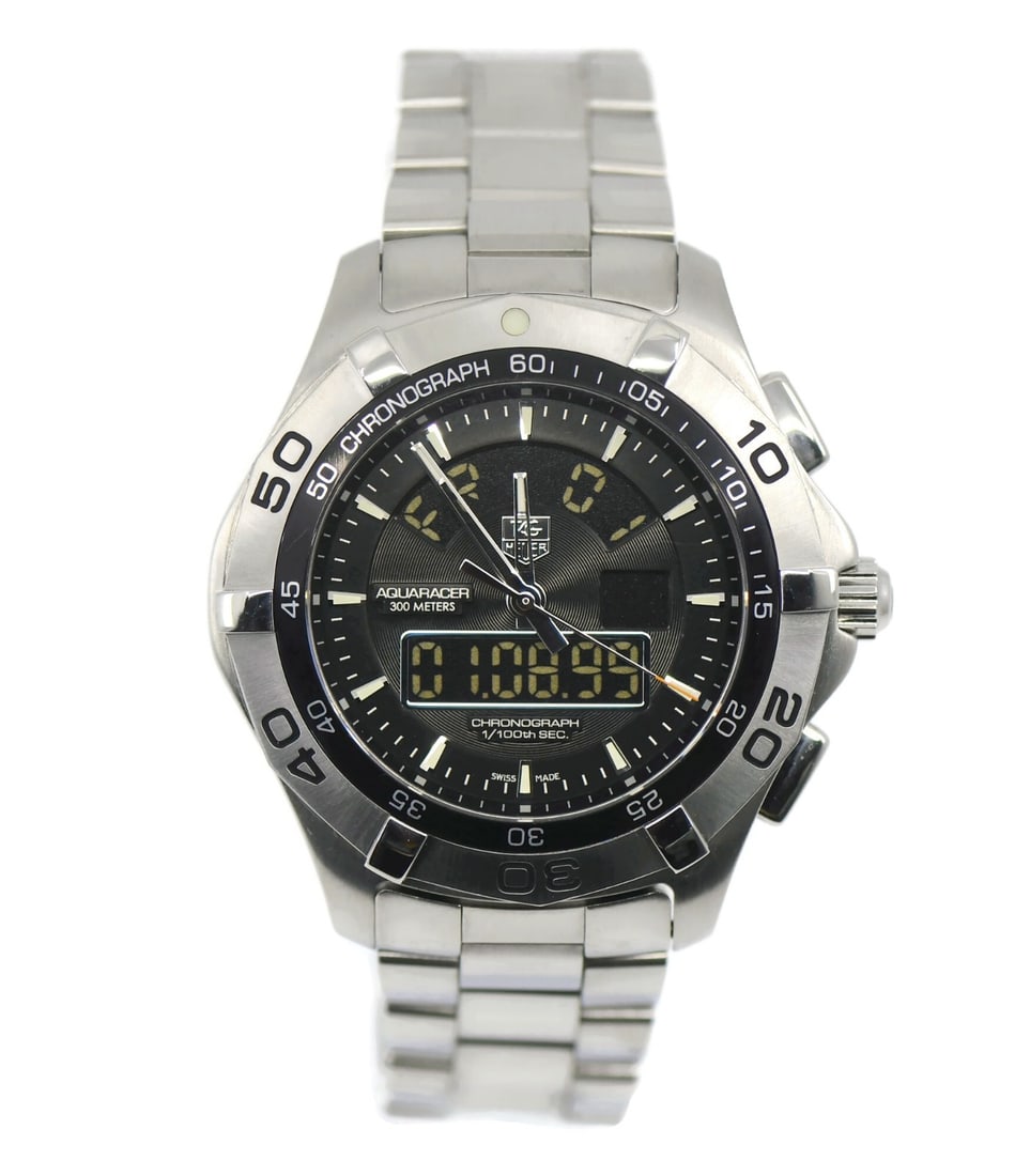 TAG Heuer Aquaracer CAF1010 men's quartz stainless wristwatch with box papers: TAG Heuer Aquaracer CAF1010 men's quartz stainless wristwatch with box papers Pre-owned TAG Heuer Aquaracer men's wristwatch with a stainless steel case and bracelet. This Swiss-made watch features a 
