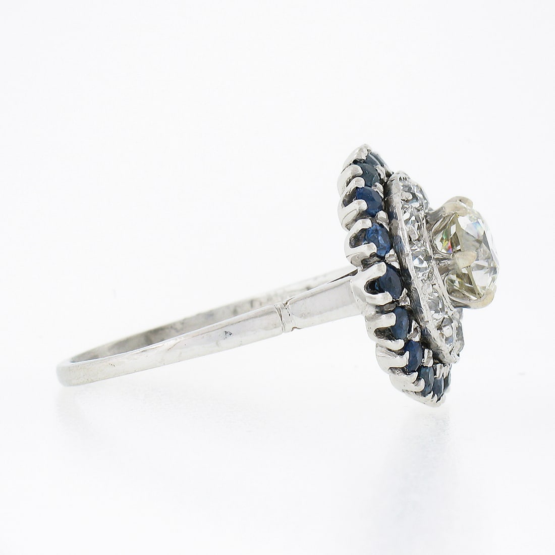Art Deco platinum ring GIA certified sapphire diamond 3.34ctw: Art Deco platinum ring GIA certified sapphire diamond 3.34ctw This antique Art Deco ring is crafted from solid .900 platinum and features a GIA-certified 1.34 carat old European cut diamond at its cen