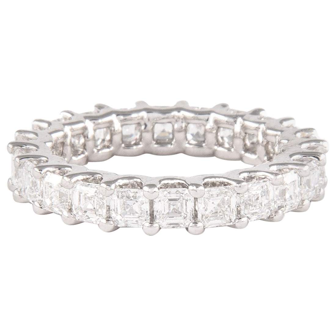 3.22ct Asscher Cut Diamond Eternity Ring Platinum: 3.22ct Asscher Cut Diamond Eternity Ring Platinum This exquisite eternity band features 22 Asscher cut diamonds totaling 3.22 carats, showcasing a stunning D-F color and VVS clarity. Crafted from prem