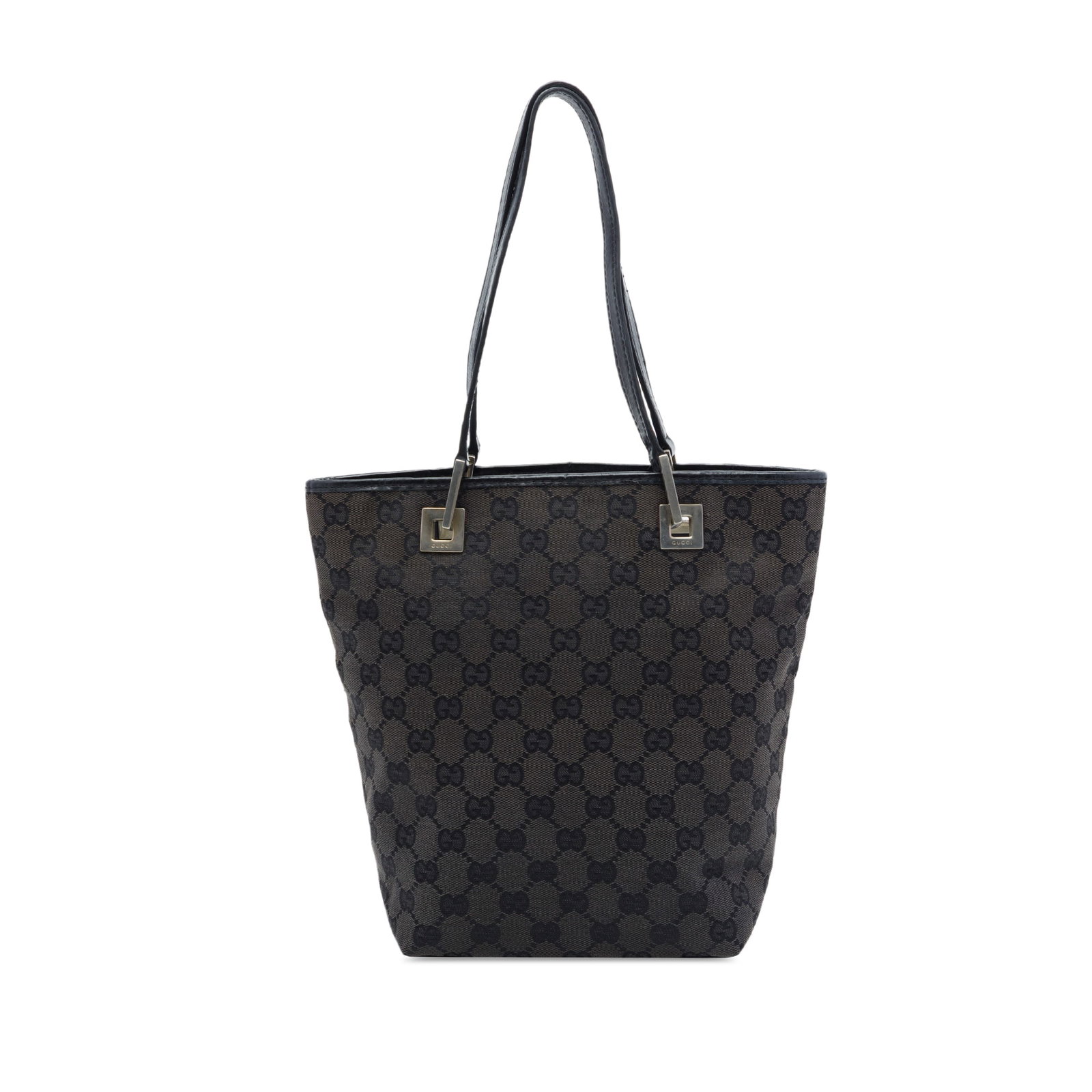 Gucci GG Canvas Tote Bag Brown Leather Trim: Gucci GG Canvas Tote Bag Brown Leather Trim This Gucci GG Canvas Tote is a brown bag made in Italy with a canvas body, leather trim, flat leather handles, an open top, and an interior zip pocket. It i
