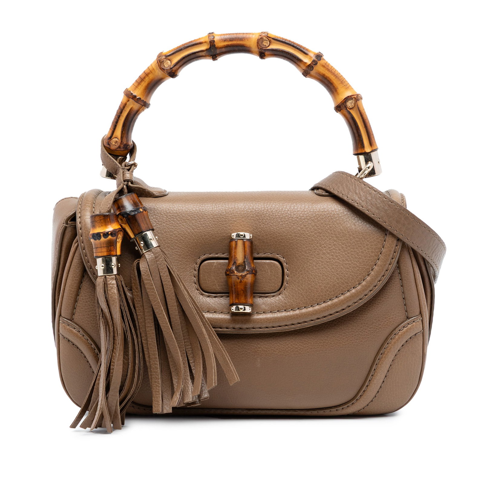 Gucci New Bamboo Medium Brown Leather Satchel With Bamboo Handle: Gucci New Bamboo Medium Brown Leather Satchel With Bamboo Handle This Gucci Medium Calfskin New Bamboo Top Handle Bag features a brown leather body with distinctive bamboo top handle and bamboo twist 