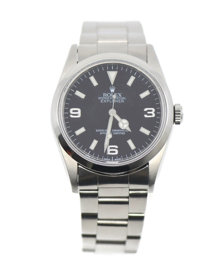 Rolex 14270 Explorer men's stainless steel wristwatch with box: Rolex 14270 Explorer men's stainless steel wristwatch with box Pre-owned luxury wristwatch in stainless steel with a silver smooth bezel, black dial, and Arabic numeral indices. This Rolex Explorer mo