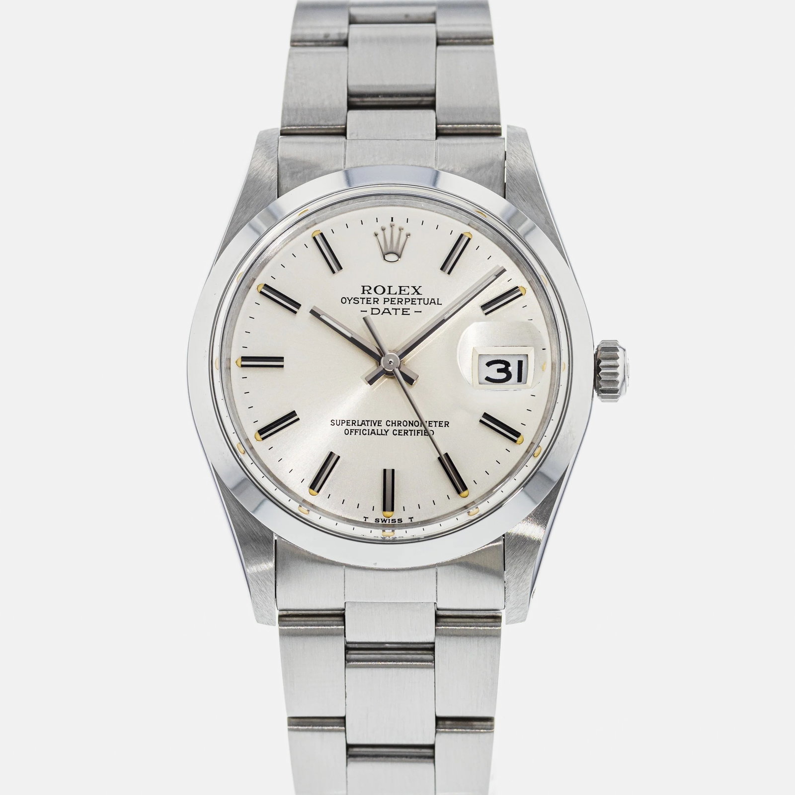 Rolex Oyster Perpetual Date Ref 15000 Silver Stick Dial Oyster Bracelet: Rolex Oyster Perpetual Date Ref 15000 Silver Stick Dial Oyster Bracelet This Rolex Oyster Perpetual Date features a classic silver stick dial, complemented by a smooth bezel and the iconic Oyster brac