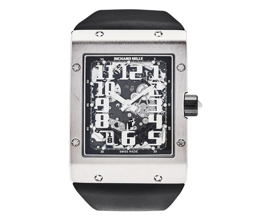Richard Mille Extra Flat Openwork Dial Rubber Band RM016 Papers 2021: Richard Mille Extra Flat Openwork Dial Rubber Band RM016 Papers 2021 This Richard Mille Extra Flat watch features an openwork dial and is paired with a durable rubber band. The model reference is RM01