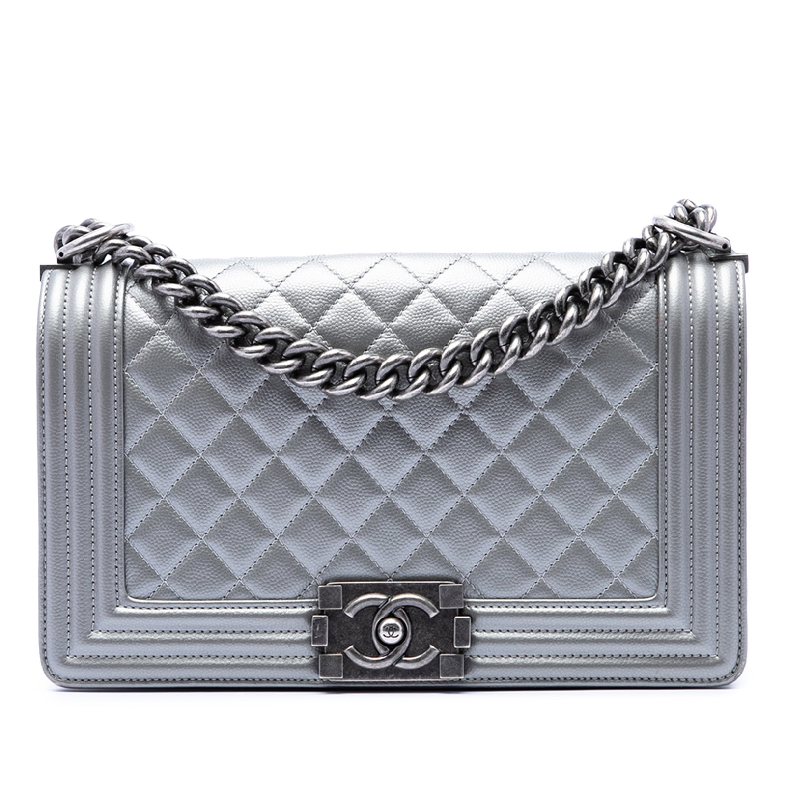 Chanel Boy Flap Old Medium metallic caviar quilted crossbody bag: Chanel Boy Flap Old Medium metallic caviar quilted crossbody bag This Chanel Boy Flap crossbody bag is crafted in metallic caviar leather with a quilted body and silver color finish. It features a cur