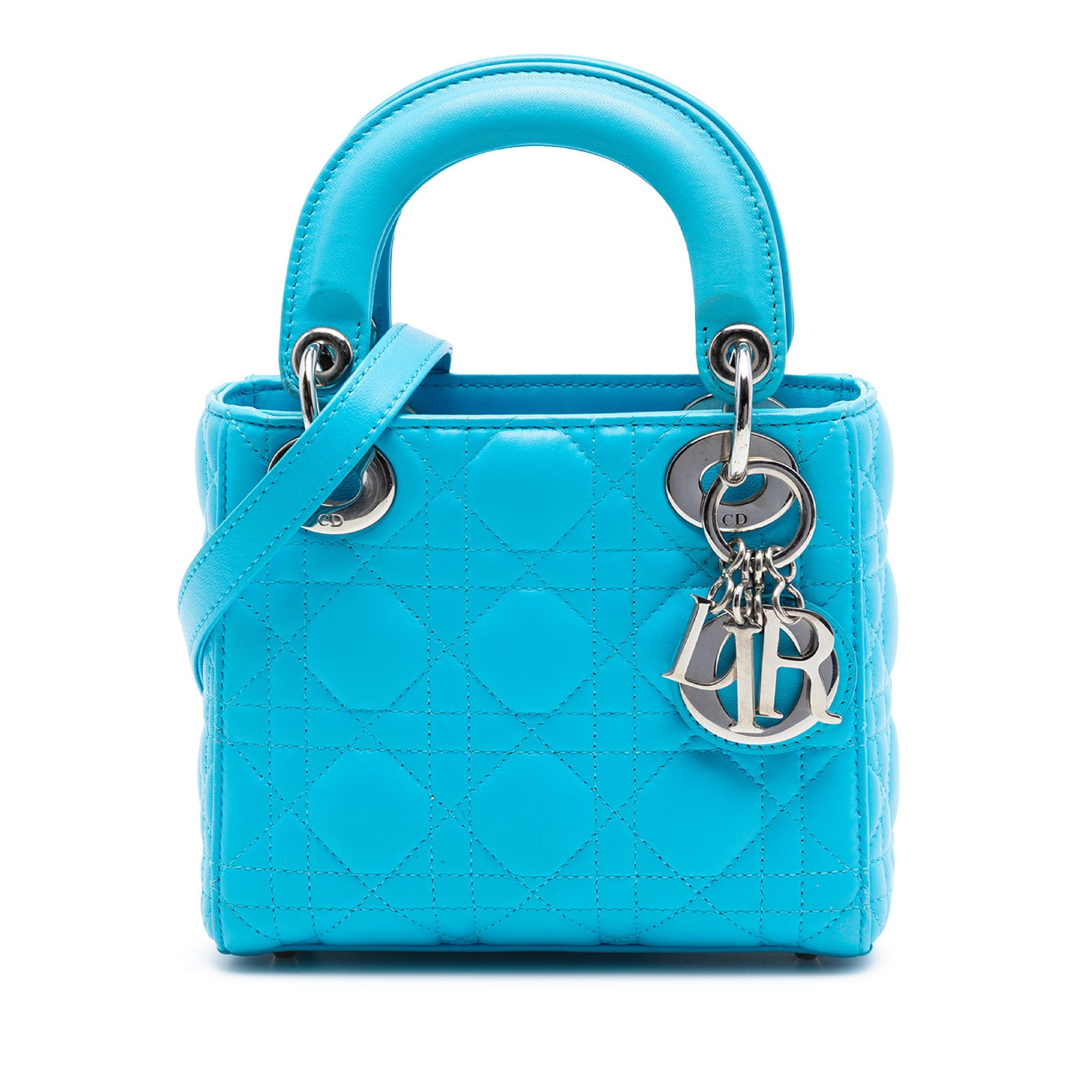 Dior Lady Dior Mini Blue Lambskin Cannage Bag: Dior Lady Dior Mini Blue Lambskin Cannage Bag Mini Lady Dior bag in blue quilted lambskin leather with Cannage detailing. It features flat leather top handles, a detachable flat leather shoulder strap