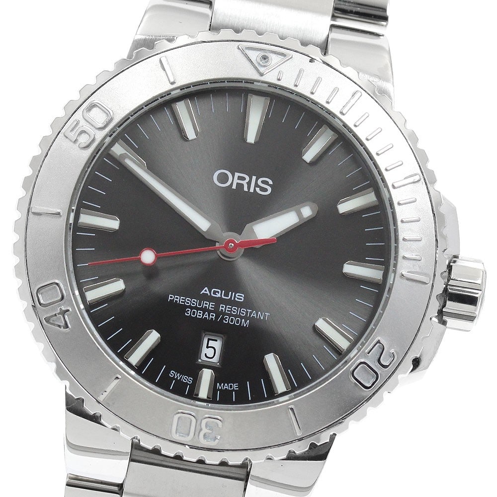 ORIS Aquis Date Relief Automatic Mens Wristwatch Ref 01 733 7730 4153-07: ORIS Aquis Date Relief Automatic Mens Wristwatch Ref 01 733 7730 4153-07 Oris Aquis Date Relief automatic men's wristwatch in pre-owned condition. This Swiss-made watch features the Aquis Date Relief 