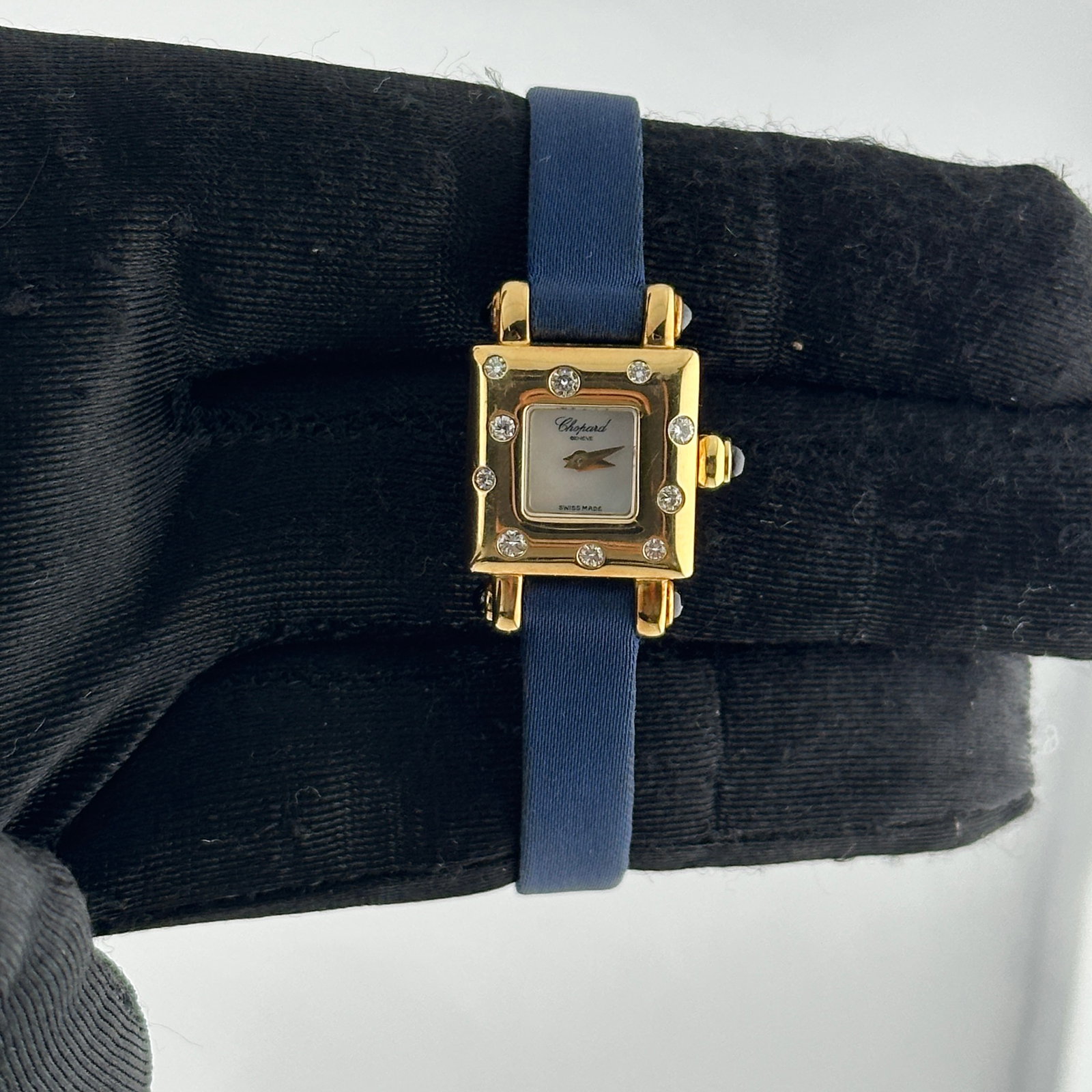 Ladies Chopard Ref 4371 Mother of Pearl Dial Diamond Bezel Synthetic Strap Watch: Ladies Chopard Ref 4371 Mother of Pearl Dial Diamond Bezel Synthetic Strap Watch This Chopard ladies' watch features a mother-of-pearl dial and a factory diamond bezel, paired with a synthetic leather
