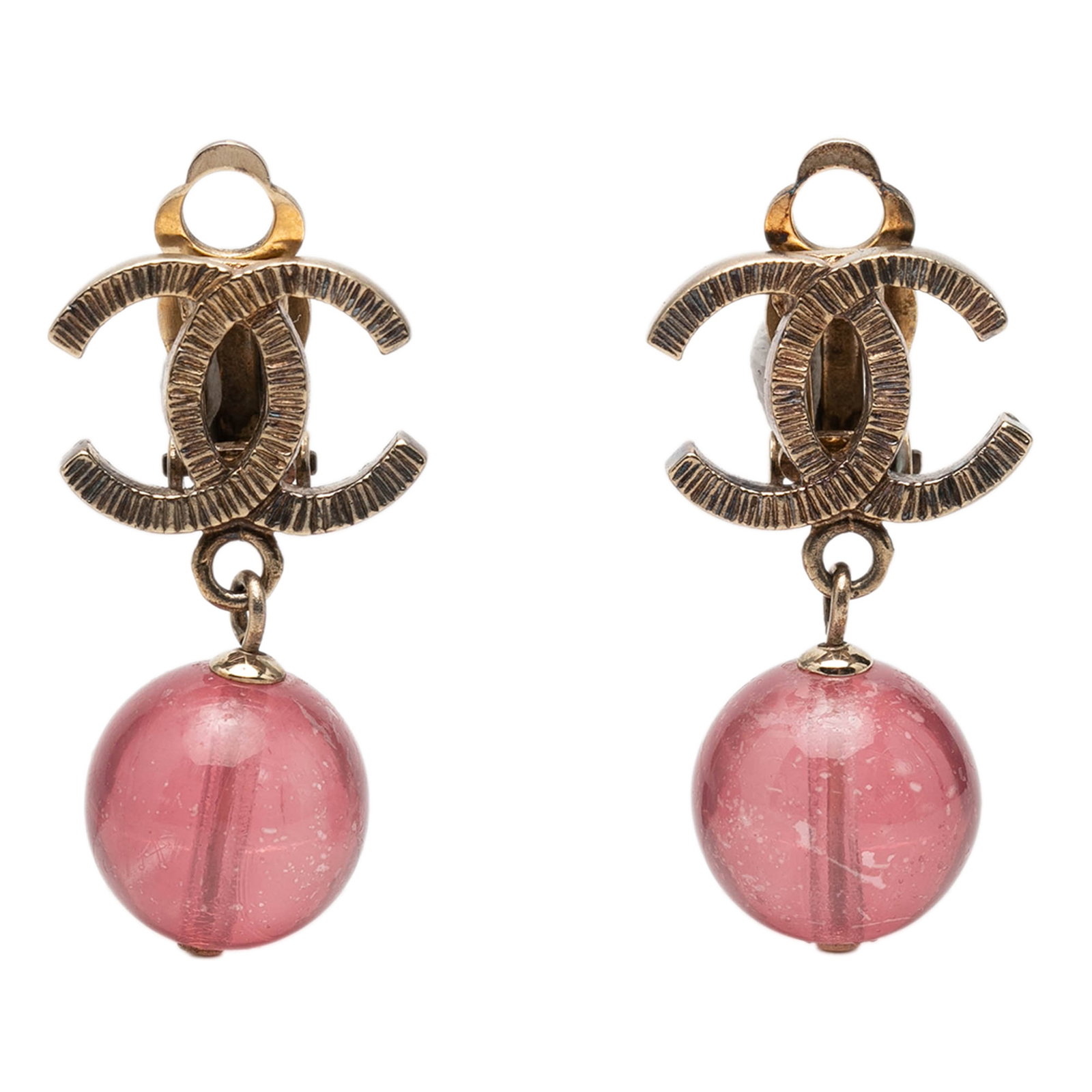 Chanel CC Clip On Drop Earrings in Gold Tone Metal and Resin: Chanel CC Clip On Drop Earrings in Gold Tone Metal and Resin Clip-on drop earrings by Chanel featuring gold-tone metal bodies with resin CC charms. Made in France, this costume jewelry pair shows visi