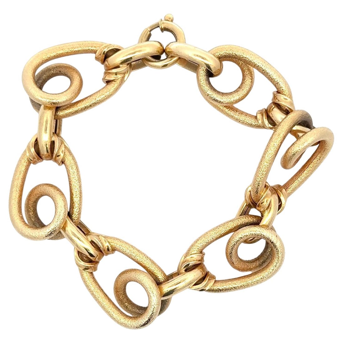 Harbor Diamonds 18K Yellow Gold Swirl Link Bracelet 36.2g: Harbor Diamonds 18K Yellow Gold Swirl Link Bracelet 36.2g This stunning 18 Karat Yellow Gold Link Bracelet exudes contemporary elegance with its unique interlocking swirl design. Crafted from high-qua
