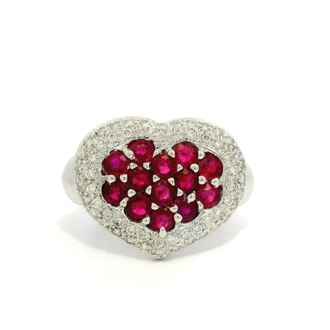 Stunning 18k White Gold GIA 2.80ct Ruby Diamond Heart Ring: Stunning 18k White Gold GIA 2.80ct Ruby Diamond Heart Ring This striking cocktail ring features a stunning heart-shaped design, crafted from solid 18k white gold. At its center, the ring showcases 13 