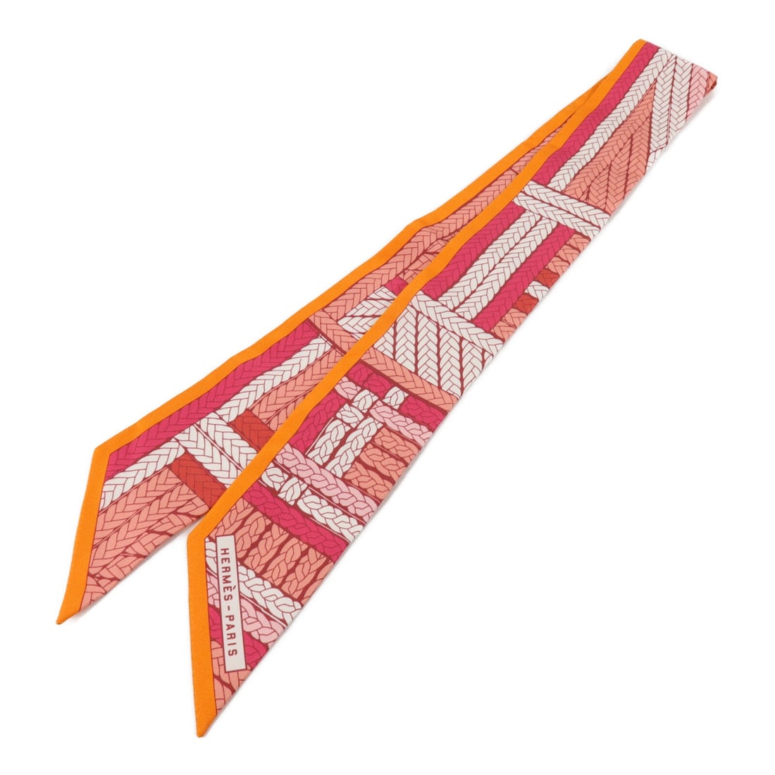 Hermes Twilly Silk Scarf Pink Orange France: Hermes Twilly Silk Scarf Pink Orange France Hermes Twilly scarf in silk with a pink and orange colorway. This women's regular-size scarf is made in France and is presented in very good AB condition. A