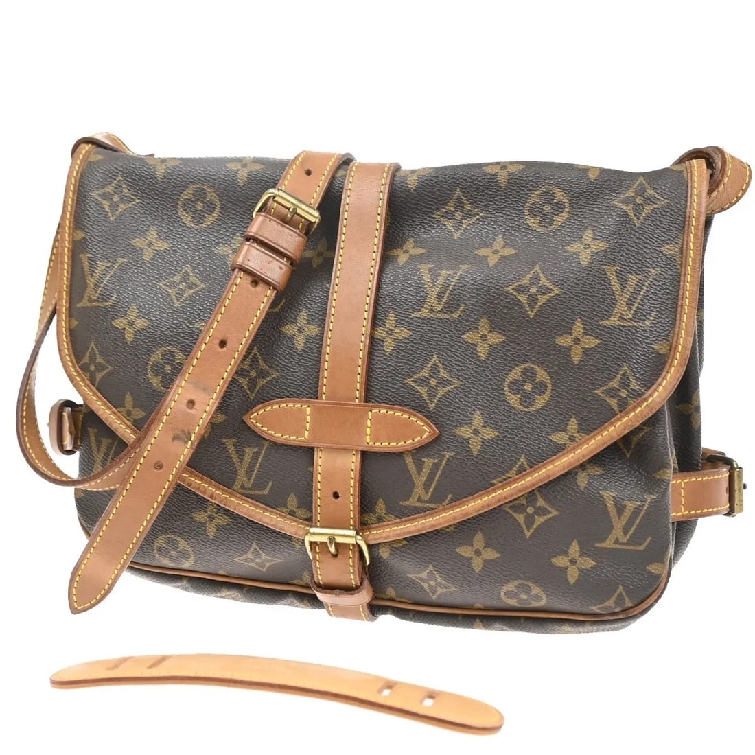 Louis Vuitton Saumur shoulder bag in brown monogram canvas: Louis Vuitton Saumur shoulder bag in brown monogram canvas This Louis Vuitton Saumur Handbag features the iconic Monogram Canvas in a classic brown color. Designed for unisex use, it offers a spacious