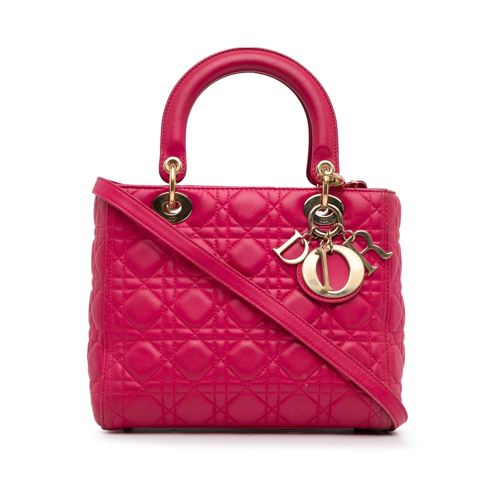 Dior Medium Lambskin Cannage Pink Lady Dior Bag: Dior Medium Lambskin Cannage Pink Lady Dior Bag The Medium Lambskin Cannage Lady Dior is a luxurious handbag crafted from quilted lambskin leather. This elegant bag features flat leather top handles a