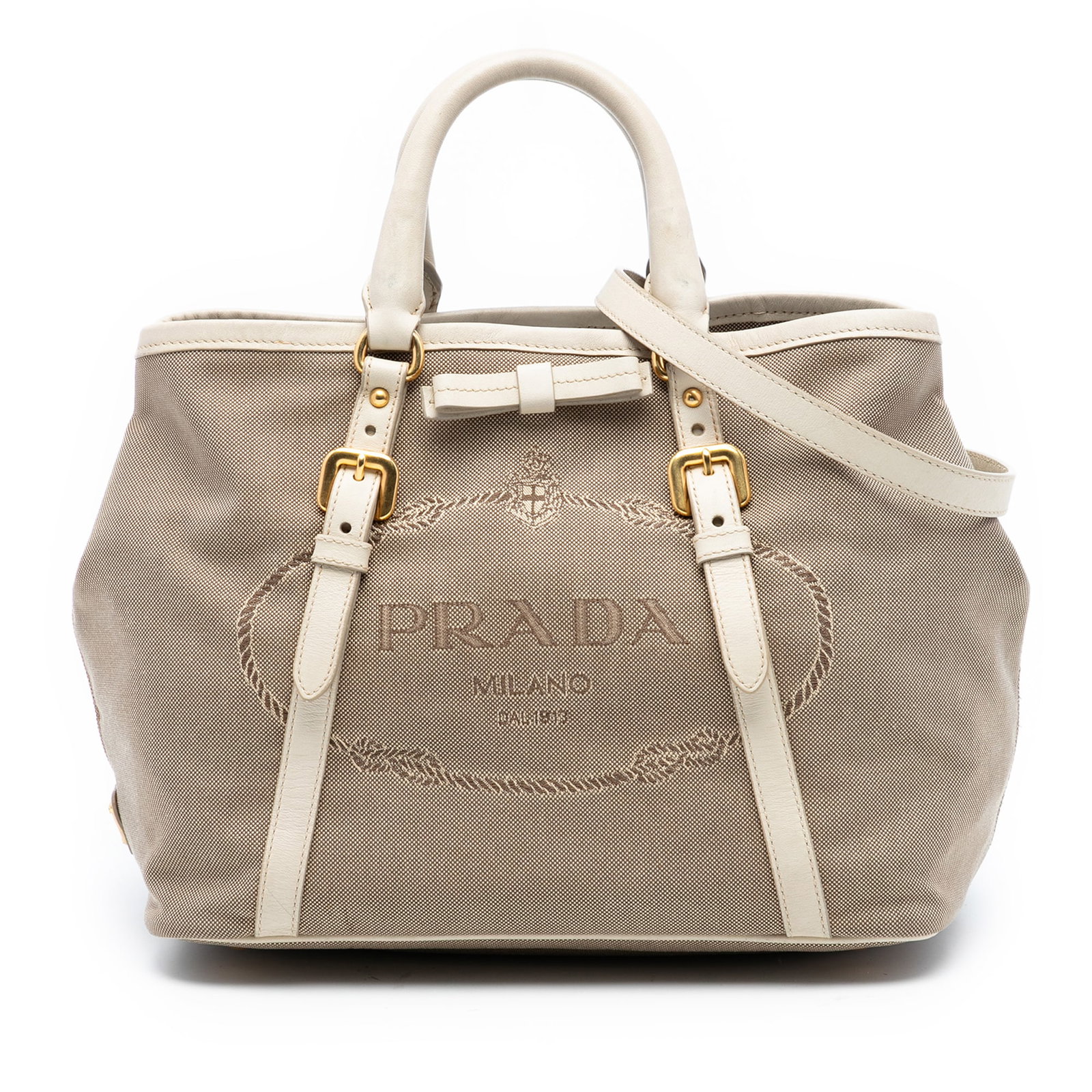 Prada Canapa Bow Beige Canvas Satchel with Leather Trim and Strap: Prada Canapa Bow Beige Canvas Satchel with Leather Trim and Strap This Prada Canvas Canapa Logo Bow Satchel features a beige canvas body with leather trim, rolled leather handles, a detachable flat le