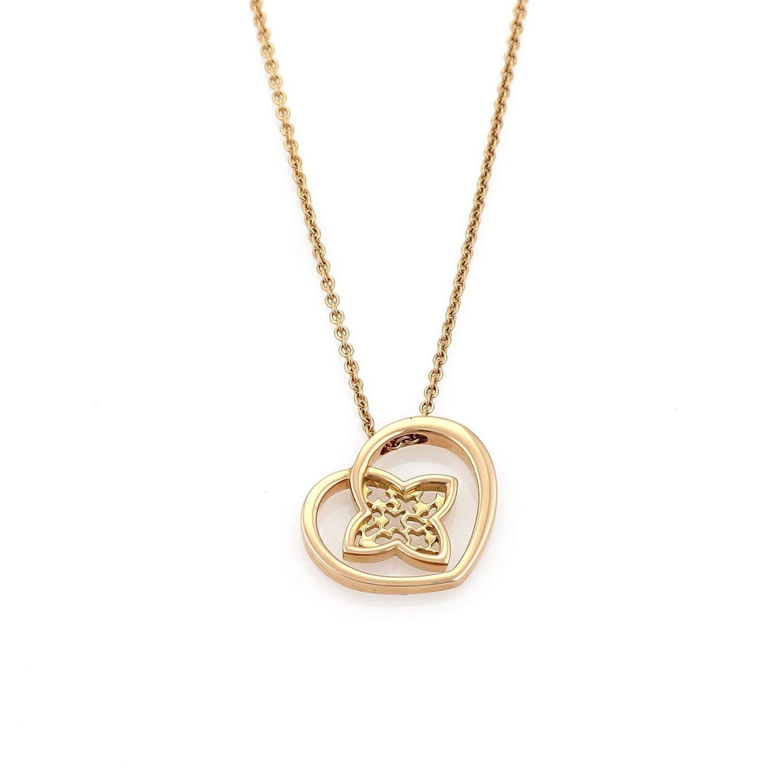 Louis Vuitton 18k Pink Gold LV Monogram Heart Flower Necklace: Louis Vuitton 18k Pink Gold LV Monogram Heart Flower Necklace A pre-owned pendant necklace crafted in 18k pink gold with a floral heart motif and LV monogram detail. Made in France, it features a chai