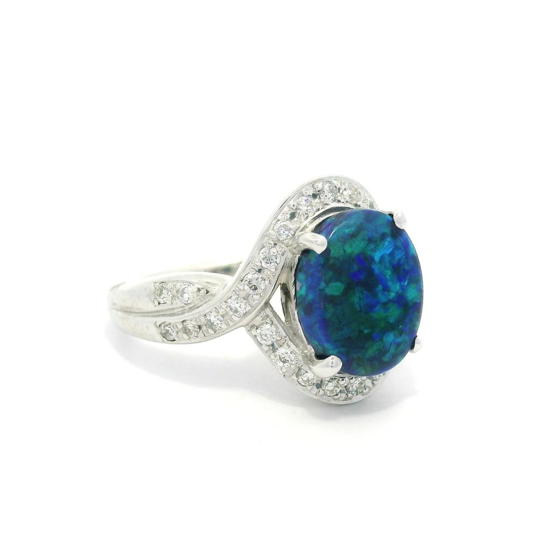 GIA Certified 2.69ctw Black Opal Diamond Halo Platinum Ring: GIA Certified 2.69ctw Black Opal Diamond Halo Platinum Ring This exquisite cocktail ring features a stunning natural black opal set in solid platinum, beautifully complemented by a twisted shoulder di